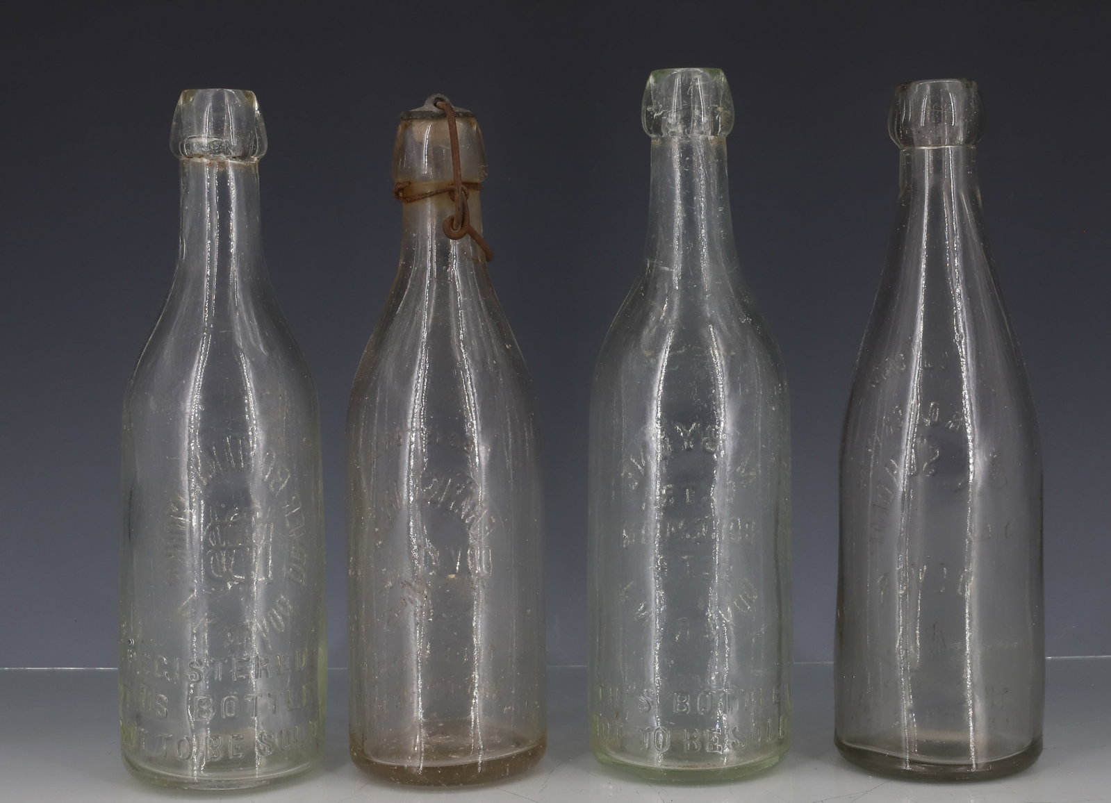 (4) DOVER, NJ BOTTLES - 2