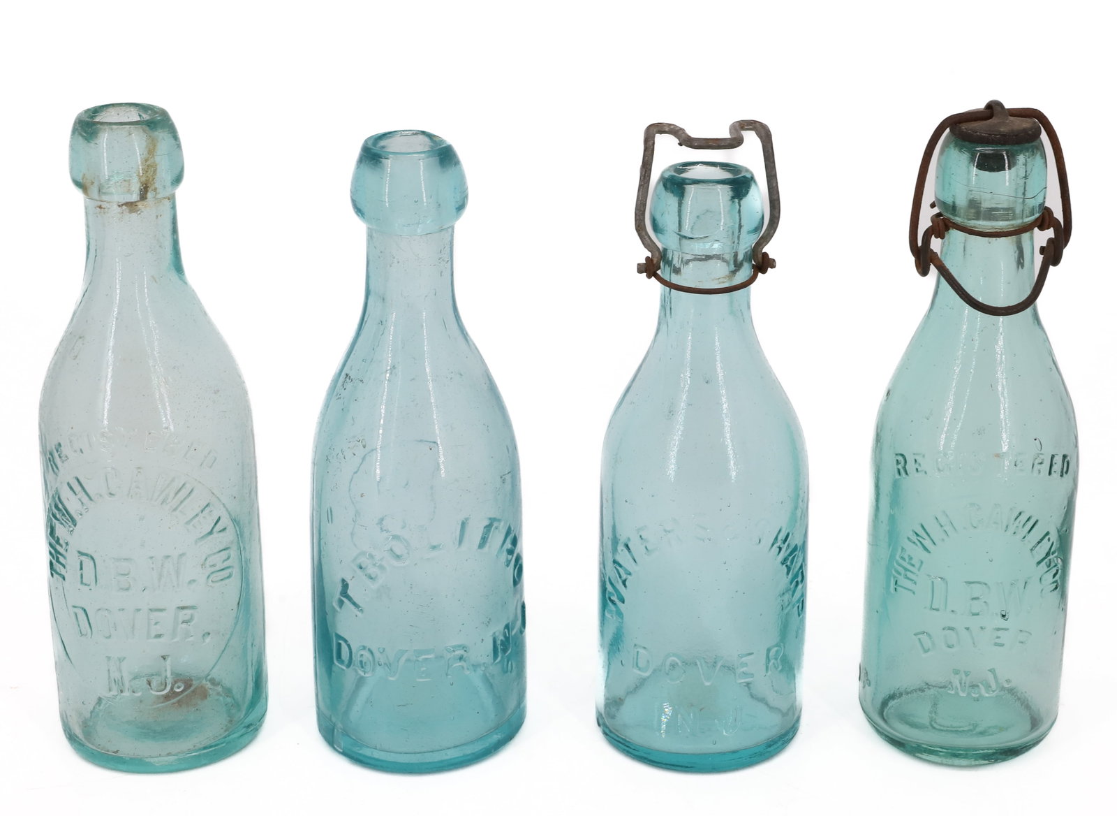 (4) AQUA DOVER, NJ BOTTLES: INCLUDING: (2) THE W.H. CAWLEY CO. WATERS & SHARP. T. BOLITHO WITH EMBOSSED "B" ON BACK. TALLEST 7 1/2" H. PLEASE READ CAREFULLY - ITEMS MUST BE PAID FOR THROUGH LIVE AUCTIONEERS OR WITH CASH OR CHECK