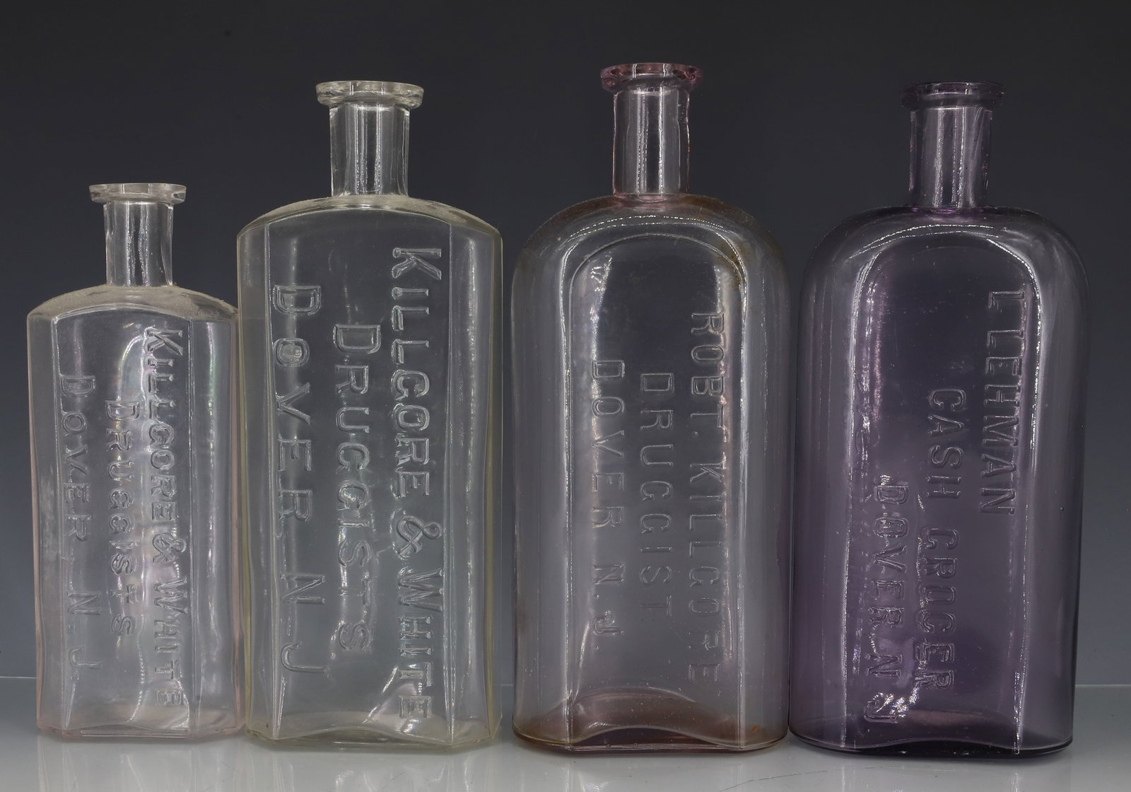 (4) DOVER, NJ EMBOSSED BOTTLES (1 of 5)