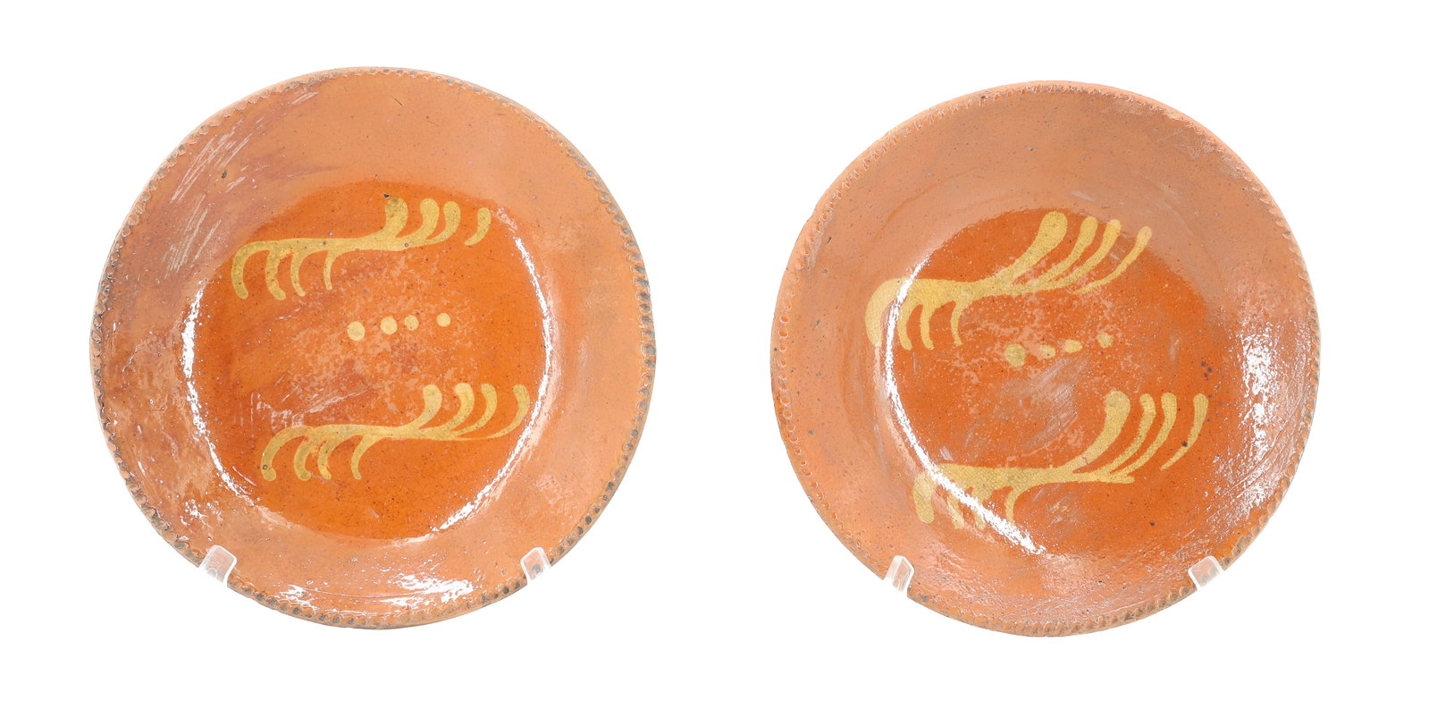 PAIR OF MATCHING REDWARE PLATES: SLIP GLAZED PIE PLATES, YELLOW SLIP DESIGN, COGGLED EDGES - 9 1/2" D PLEASE READ CAREFULLY - ITEMS MUST BE PAID FOR THROUGH LIVE AUCTIONEERS OR WITH CASH OR CHECK IN PERSON - Terms for Purchasing and