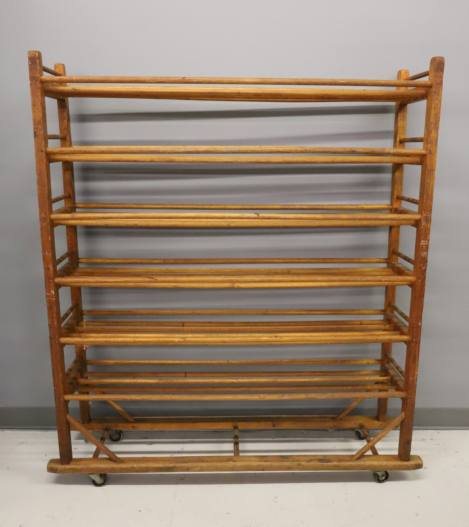 ROLLING SHOE FACTORY RACK: DOWEL SHELVES, CASTER WHEELS, 53" X 48" X 13" PLEASE READ CAREFULLY - ITEMS MUST BE PAID FOR THROUGH LIVE AUCTIONEERS OR WITH CASH OR CHECK IN PERSON - Terms for Purchasing and Shipping of Auction