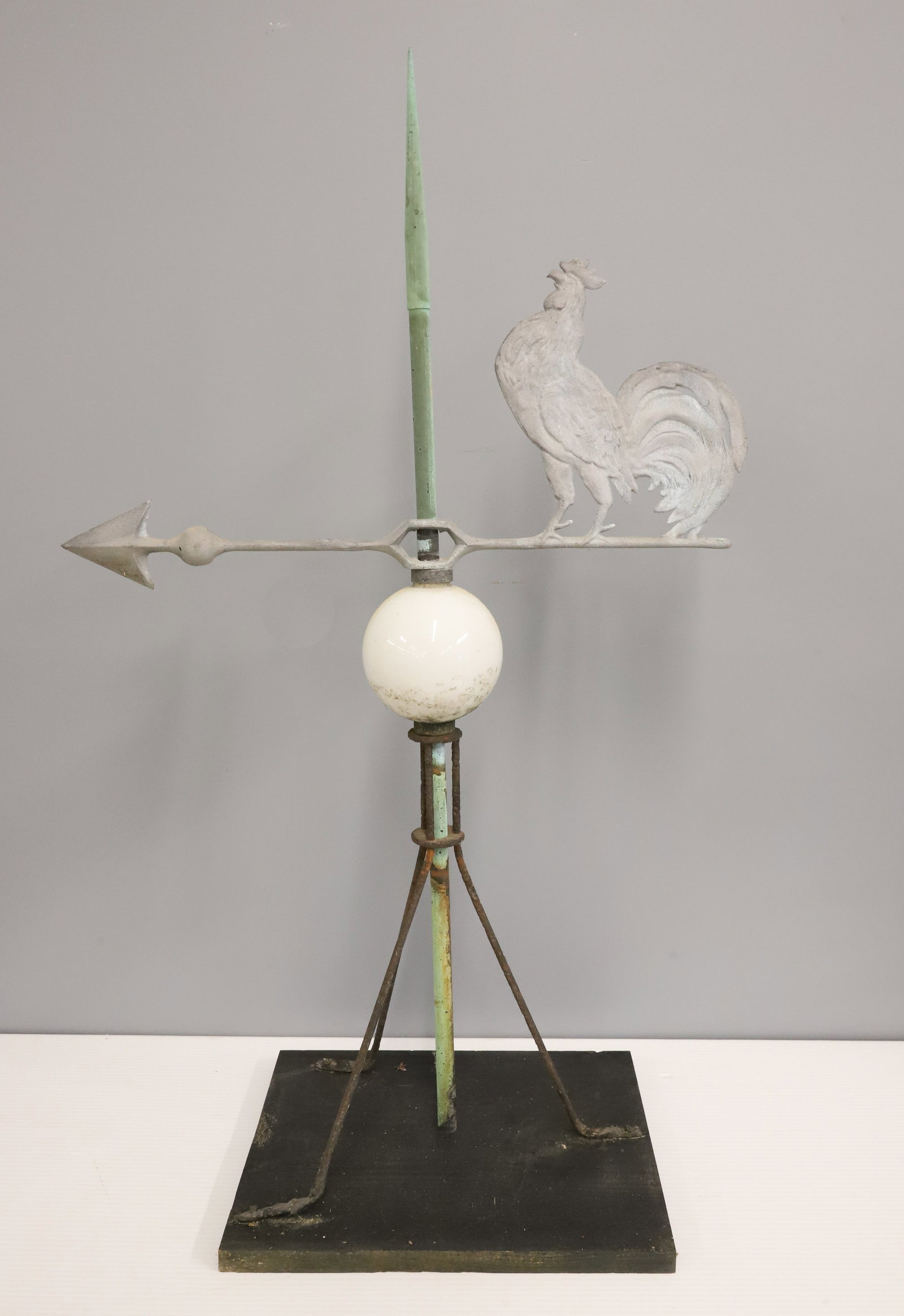 EARLY 20TH CENTURY WEATHERVANE: CAST ALUMINUM ROOSTER ON COPPER LIGHTNING ROD WITH MILK GLASS BALL - 36" X 21 1/2" PLEASE READ CAREFULLY - ITEMS MUST BE PAID FOR THROUGH LIVE AUCTIONEERS OR WITH CASH OR CHECK IN PERSON - Terms for