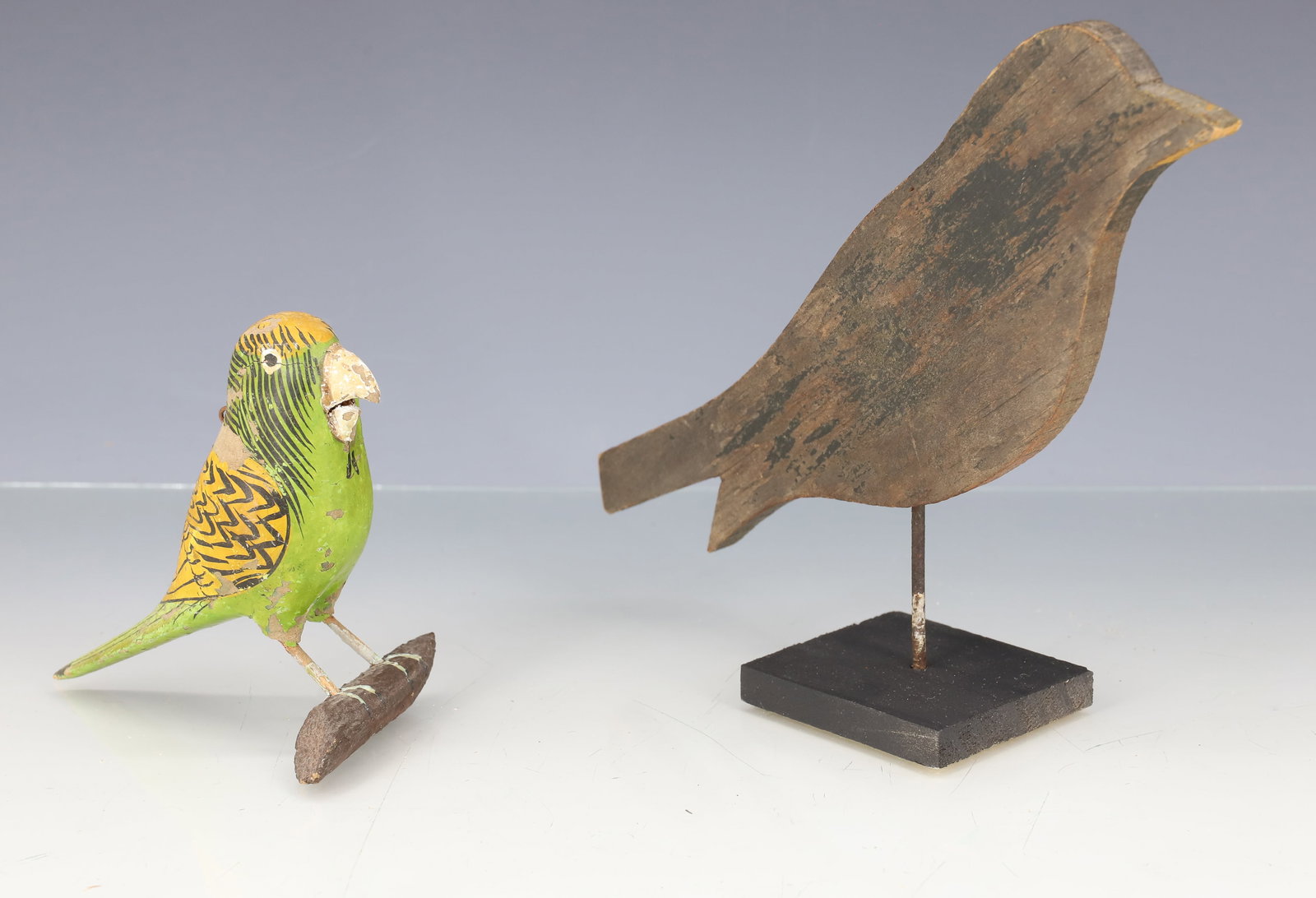 (2) FOLK ART PAINTED BIRDS: COLORFUL GREEN/YELLOW/BLACK BIRD ON PERCH 5". FLAT PAINTED BIRD ON BASE. PLEASE READ CAREFULLY - ITEMS MUST BE PAID FOR THROUGH LIVE AUCTIONEERS OR WITH CASH OR CHECK IN PERSON - Terms for Purchasing