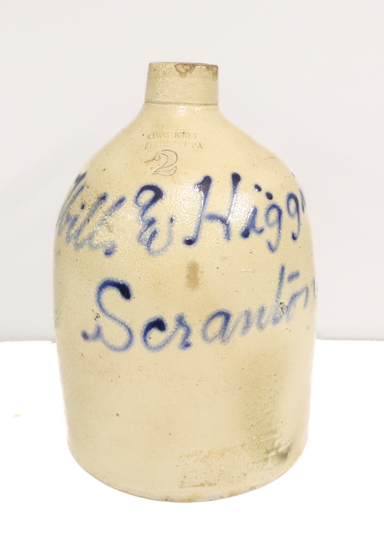 SCRANTON, PA ADVERTISING SCRIPT JUG: 2 GALLON, WILL & HIGGINS SCRANTON, PA - IMPRESSED; LEWIS JONES PITTSTON, PA - 13" PLEASE READ CAREFULLY - ITEMS MUST BE PAID FOR THROUGH LIVE AUCTIONEERS OR WITH CASH OR CHECK IN PERSON - Terms for Pu