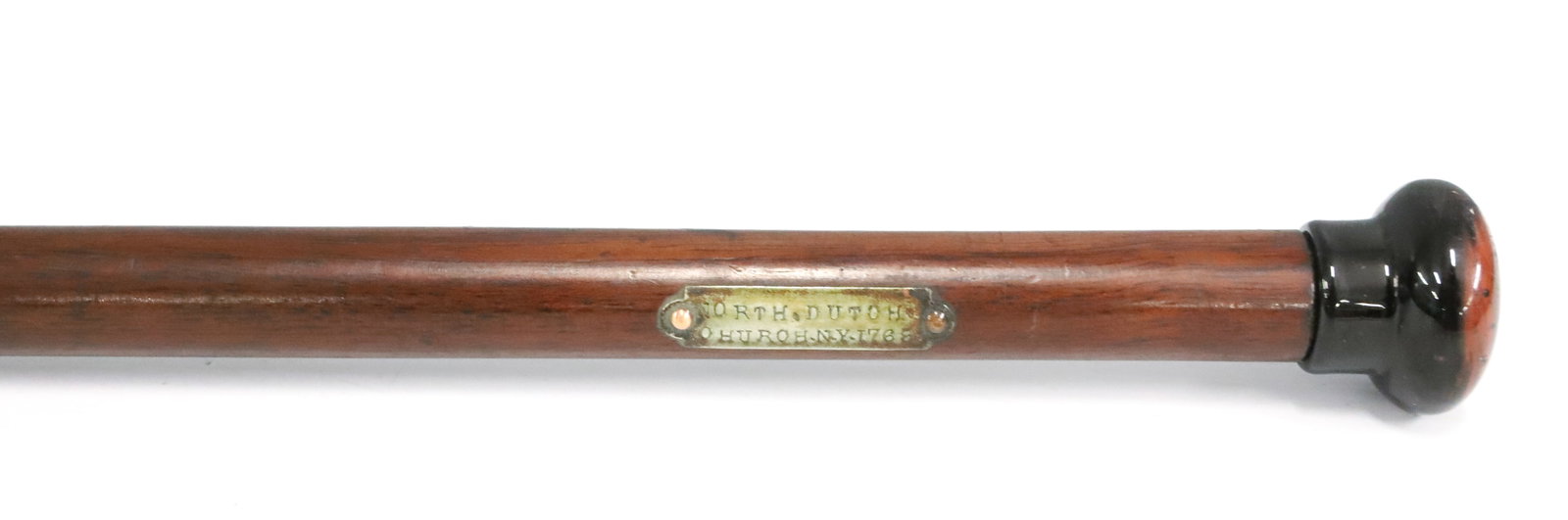 NORTH DUTCH CHURCH WALKING STICK: WOODEN SHAFT WITH POTTERY TOPPER, PLAQUE ON SHAFT READS "NORTH DUTCH CHURCH NY, 1769" - 31 1/2" L - 19TH CENTURY PLEASE READ CAREFULLY - ITEMS MUST BE PAID FOR THROUGH LIVE AUCTIONEERS OR WITH CASH