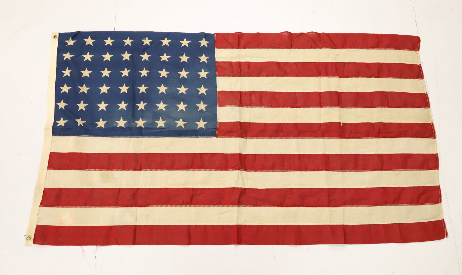 48 STAR AMERICAN FLAG: COTTON WITH PRINTED STARS - 32" X 57" PLEASE READ CAREFULLY - ITEMS MUST BE PAID FOR THROUGH LIVE AUCTIONEERS OR WITH CASH OR CHECK IN PERSON - Terms for Purchasing and Shipping of Auction Items.