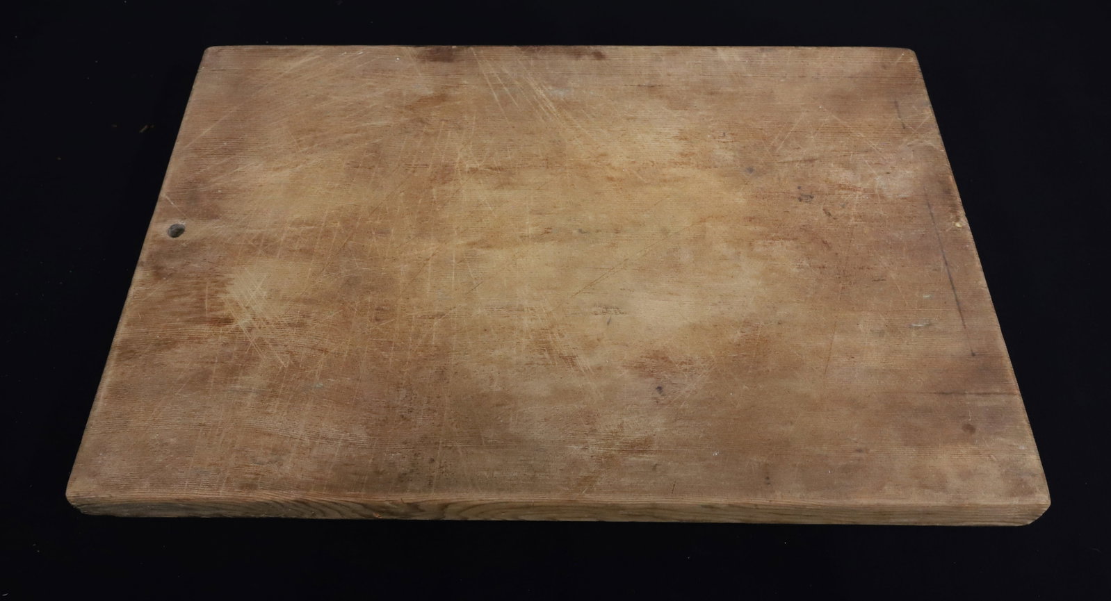 RECTANGULAR WOODEN CUTTING BOARD: 11 3/4" X 17 3/4". 1" THICK. PLEASE READ CAREFULLY - ITEMS MUST BE PAID FOR THROUGH LIVE AUCTIONEERS OR WITH CASH OR CHECK IN PERSON - Terms for Purchasing and Shipping of Auction Items. Please read