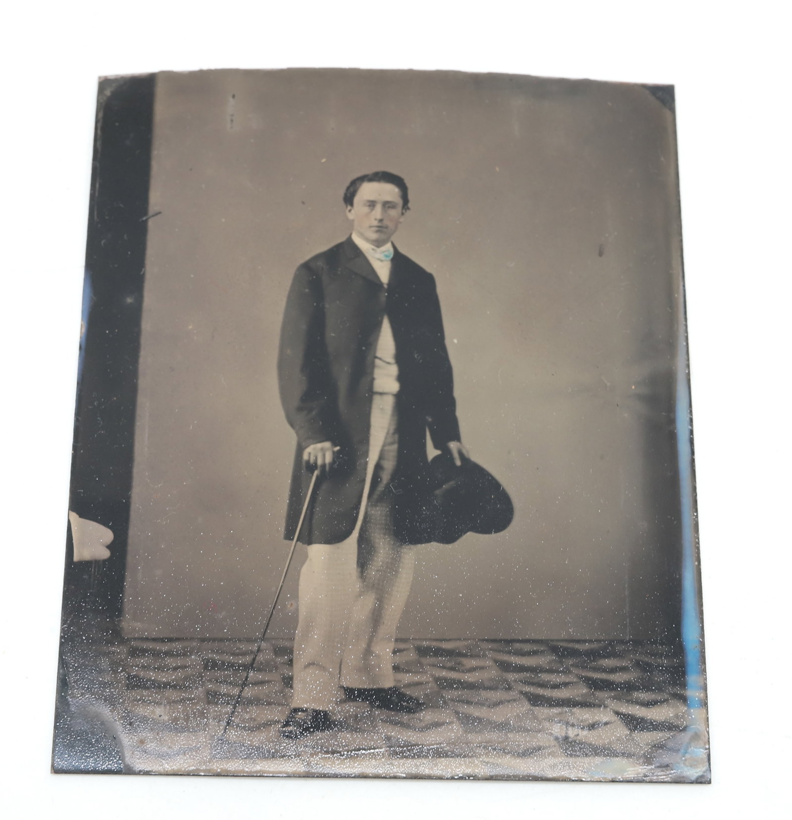 TINTYPE OF CIVIL WAR SOLDIER: CORPORAL SOLDIER OF "C" COMPANY, 127TH. CIVILIAN CLOTHES. 4" X 3 1/8". PLEASE READ CAREFULLY - ITEMS MUST BE PAID FOR THROUGH LIVE AUCTIONEERS OR WITH CASH OR CHECK IN PERSON - Terms for Purchasing