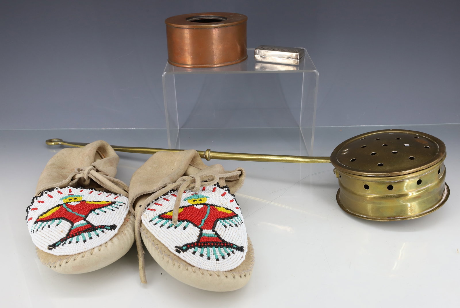 LOT OF BEADED MOCCASINS AND METALWARE: BEADED LEATHER MOCCASINS 10" L. STERLING SILVER HINGED BOX W/ MONOGRAM 2 1/4" L., ENGLISH BRASS CHESTNUT ROASTER 20" L. AND COPPER VESSEL 4" L. (INKWELL BASE?) PLEASE READ CAREFULLY - ITEMS MUST BE
