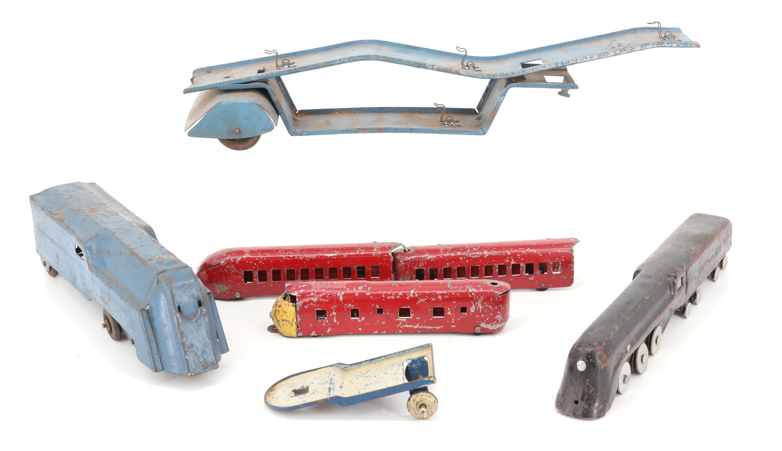 LOT OF PRESSED METAL TRAINS AND MORE: BLUE METAL TRAIN LOCOMOTIVE 11" L. "STAFFORD LINE" BLACK LOCOMOTIVE/TENDER. RED/YELLOW LOCOMOTIVE AND TWO PASSENGER CARS. CAR HAULER AND MORE. PLEASE READ CAREFULLY - ITEMS MUST BE PAID FOR THROUGH