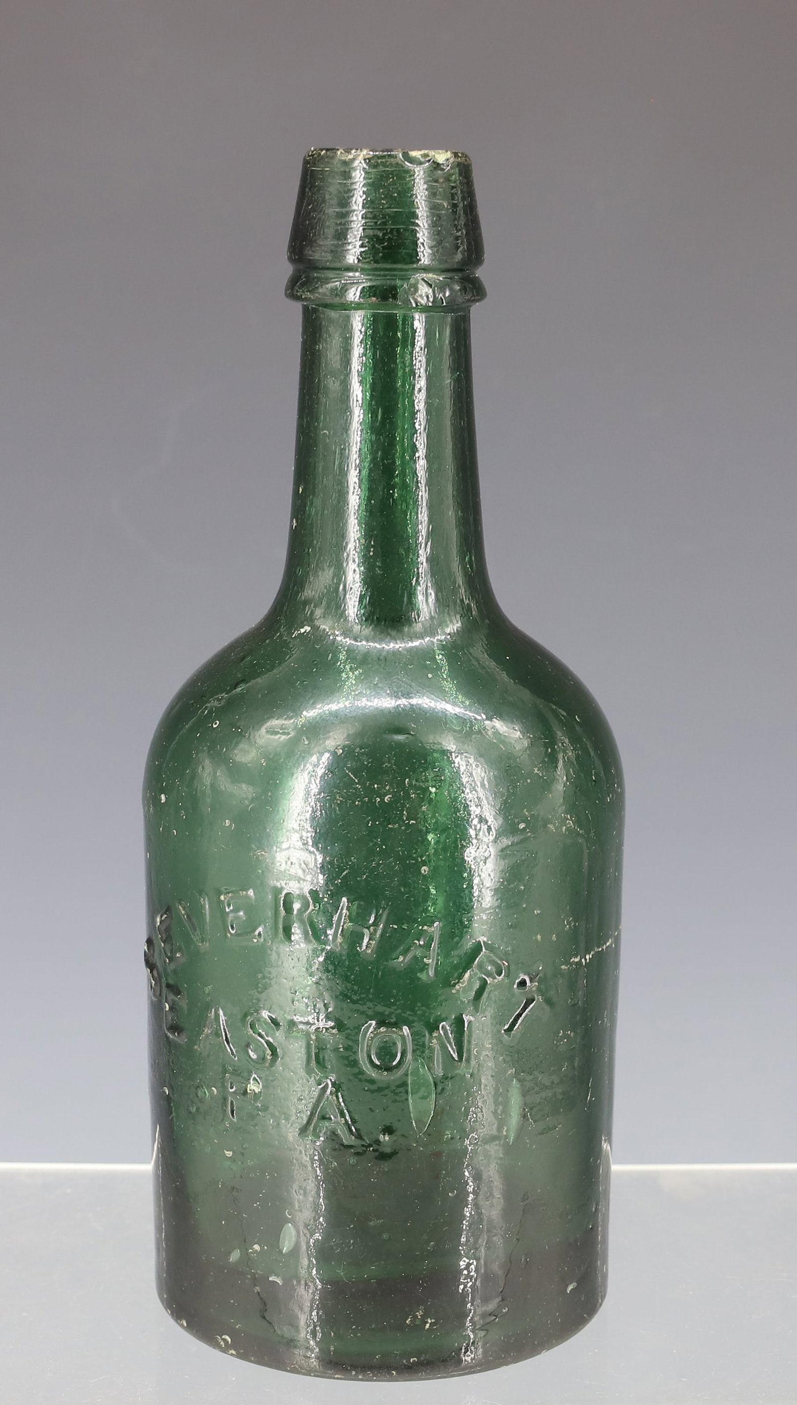 S. EVERHART, EASTON PA BOTTLE: GREEN "DYOTTVILLE GLASS WORKS PHILADA." IRON PONTIL. 7 1/4" H. PLEASE READ CAREFULLY - ITEMS MUST BE PAID FOR THROUGH LIVE AUCTIONEERS OR WITH CASH OR CHECK IN PERSON - Terms for Purchasing and