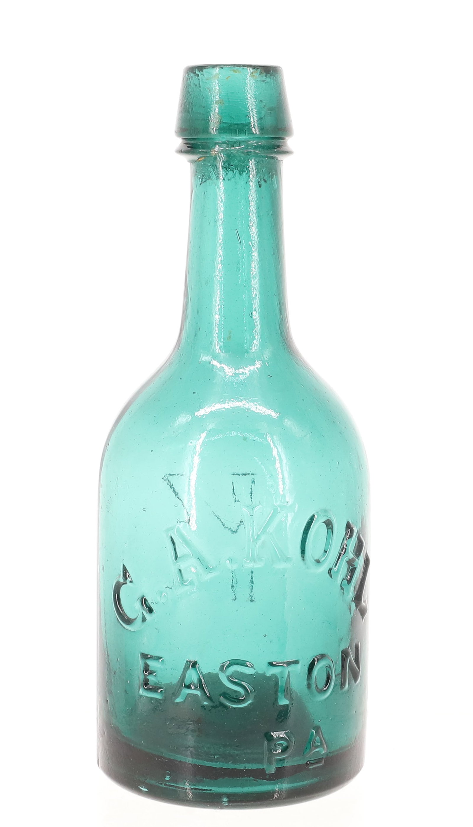 G.A. KOHL, EASTON PA BOTTLE: TEAL GREEN "K" ON BACK SIDE. IRON PONTIL. 7 5/8" H. PLEASE READ CAREFULLY - ITEMS MUST BE PAID FOR THROUGH LIVE AUCTIONEERS OR WITH CASH OR CHECK IN PERSON - Terms for Purchasing and Shipping of