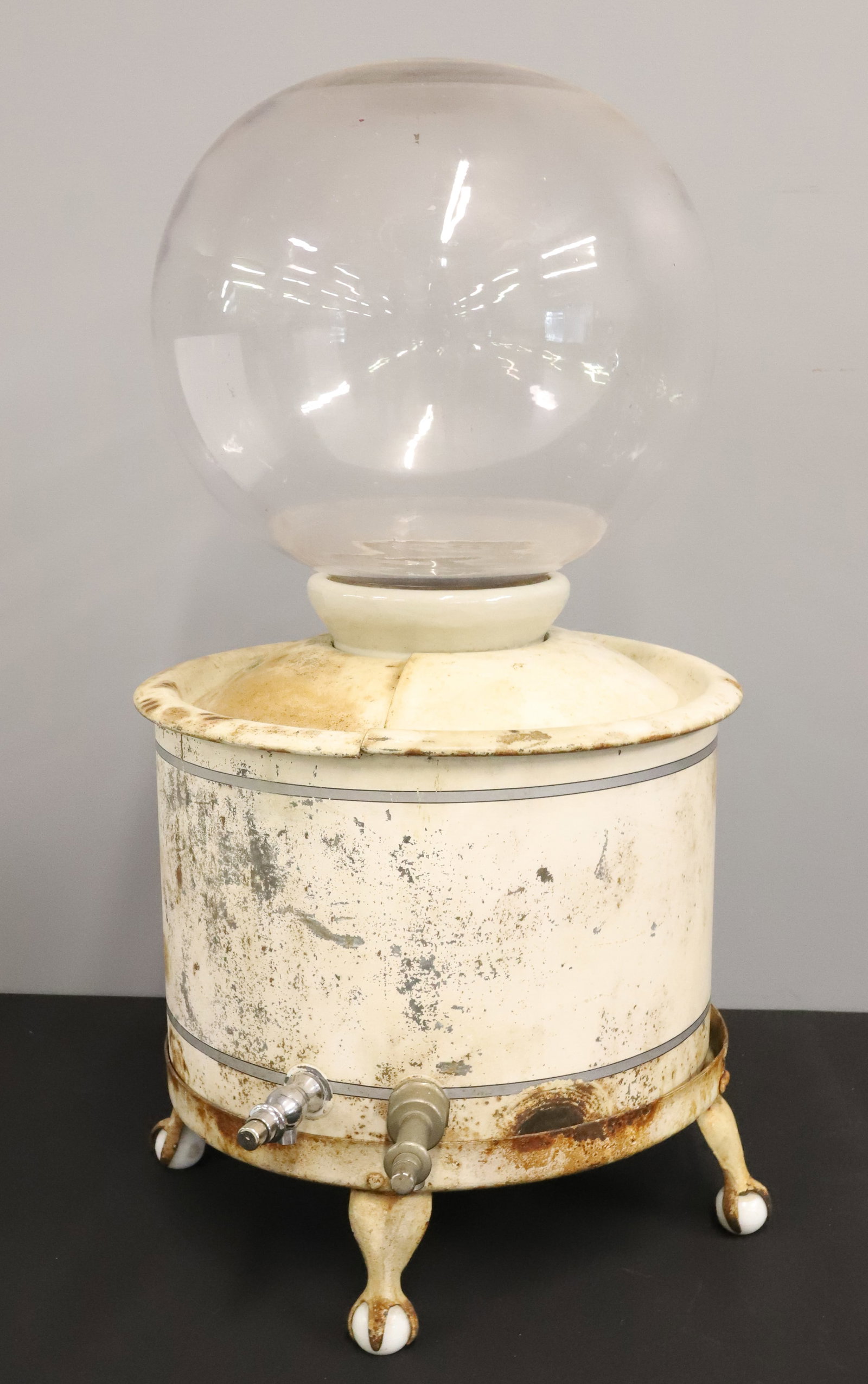 TIN/ STONEWARE / GLASS WATER COOLER: PAINTED TIN BASE ON BALL/CLAW FEET. STONEWARE INSERT MRKD. "XXTH CENTURY COOLER, CORDLEY & HAYES NEW YORK. GLASS RESERVOIR RESTS ON TOP. 27 1/4" TOTAL HEIGHT. PLEASE READ CAREFULLY - ITEMS MUST BE