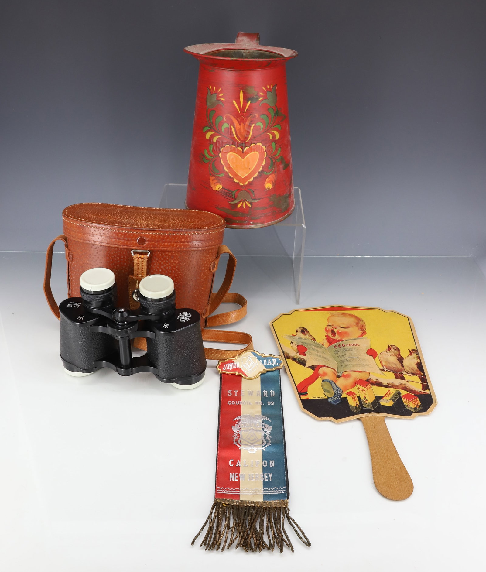 TOLEWARE PITCHER, BINOCULARS, CALIFON, NJ RIBBON: FOLK ART PAINTED TIN PITCHER 7 3/4" H., HAMBLETONIAN BINOCULARS W/ CASE. JUNIOR O.U.A.M. RIBBON (CALIFON, NJ) AND ADVERTISING FAN (EASTON, PA). PLEASE READ CAREFULLY - ITEMS MUST BE PAID FOR THROUGH