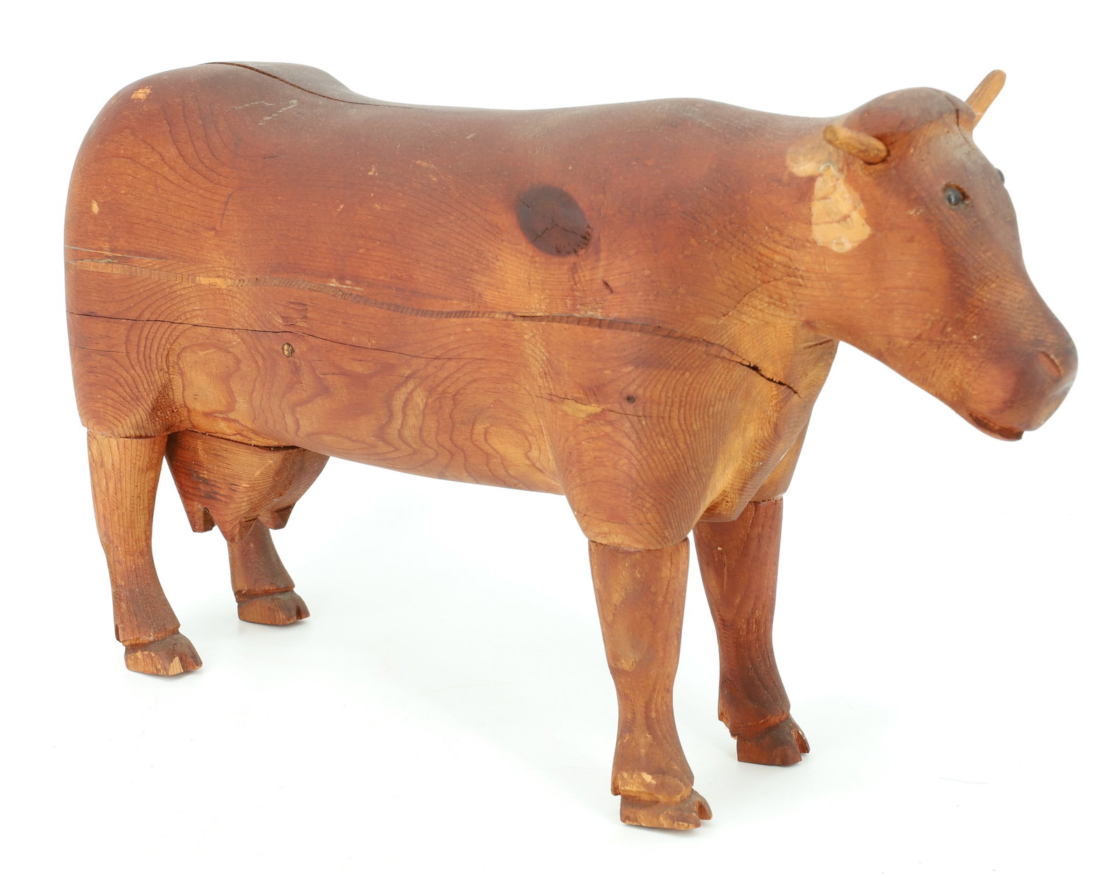 FOLK ART WOODEN COW: CARVED WOOD WITH INSET EYES AND HORNS. 17 3/4" L. PLEASE READ CAREFULLY - ITEMS MUST BE PAID FOR THROUGH LIVE AUCTIONEERS OR WITH CASH OR CHECK IN PERSON - Terms for Purchasing and Shipping of Auction
