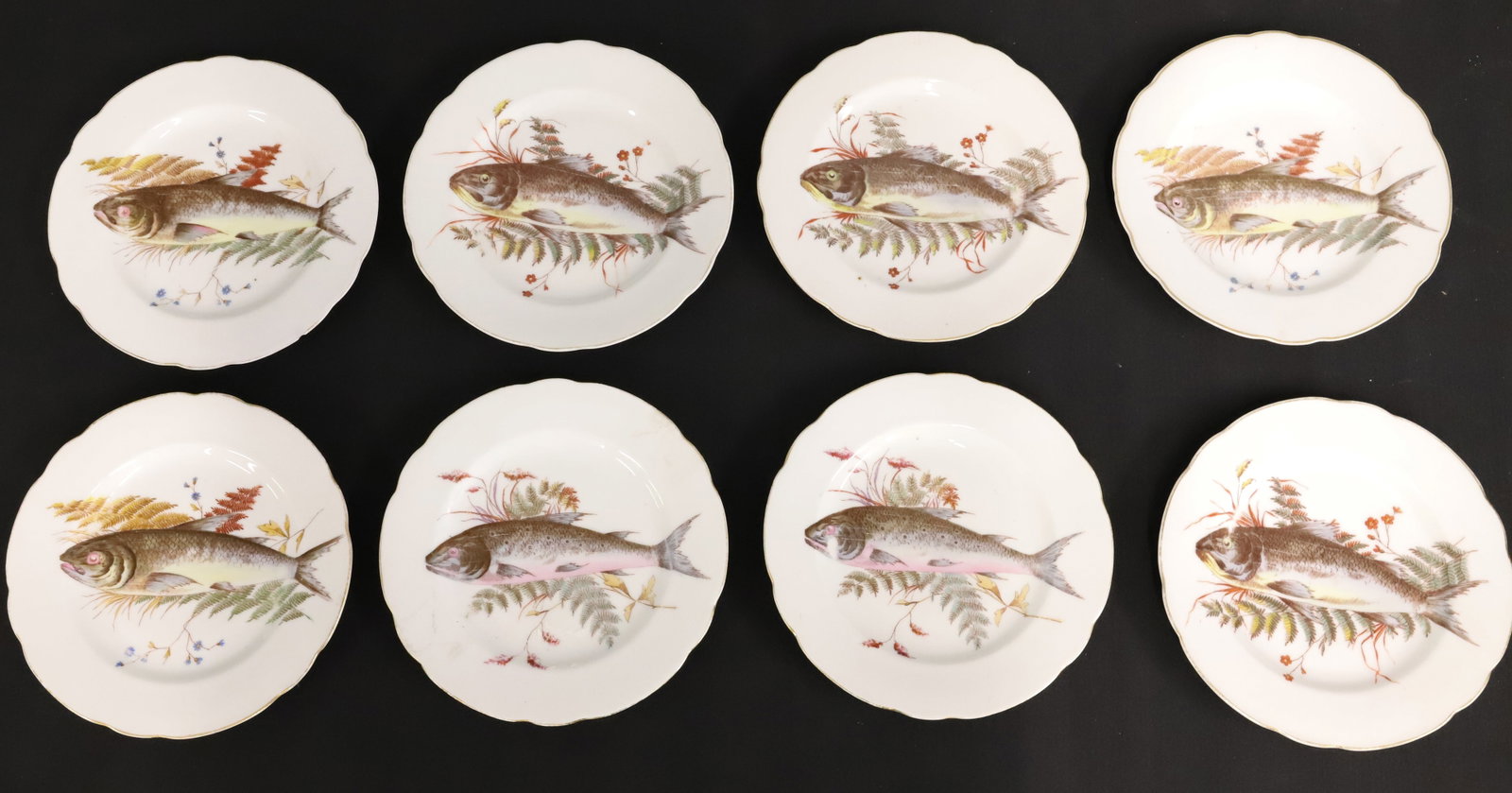 BAWO & DOTTER FISH PLATES: (8) DECORATED PLATES. STAMPED ON BACKS "KARLSBAD" (AUSTRIA). 8 1/8" D. PLEASE READ CAREFULLY - ITEMS MUST BE PAID FOR THROUGH LIVE AUCTIONEERS OR WITH CASH OR CHECK IN PERSON - Terms for Purchasing