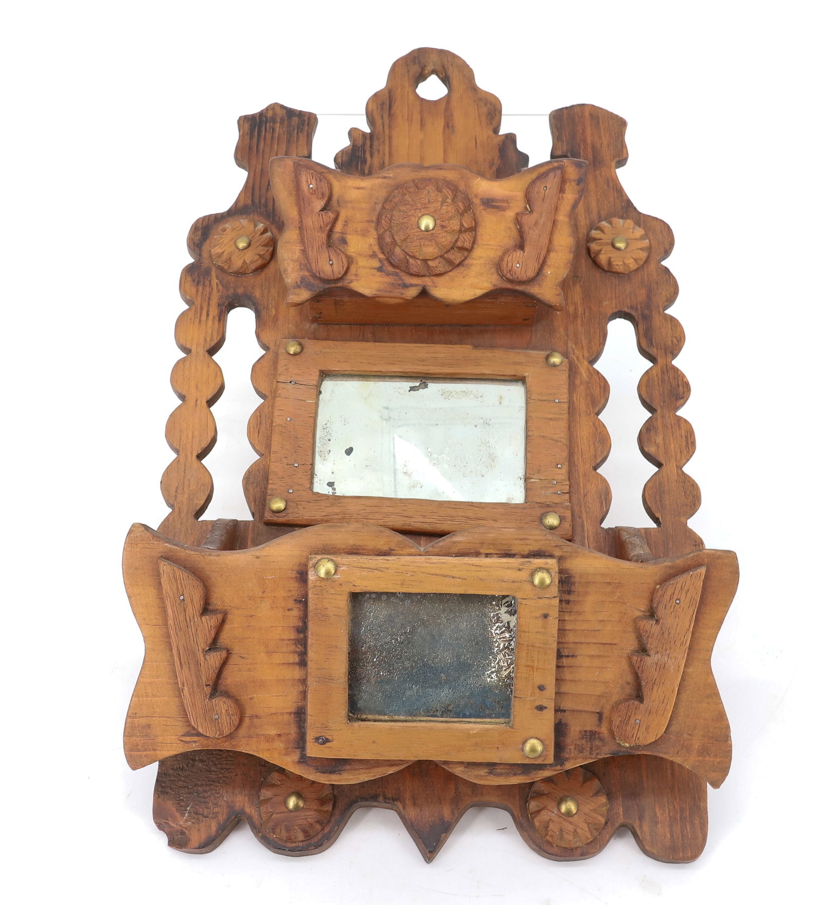 FOLK ART WALL BOX: HANGING COMB BOX. CARVED WOOD WITH BRASS TACKING AND MIRROR INSETS. 15 3/4" L. PLEASE READ CAREFULLY - ITEMS MUST BE PAID FOR THROUGH LIVE AUCTIONEERS OR WITH CASH OR CHECK IN PERSON - Terms for Purch