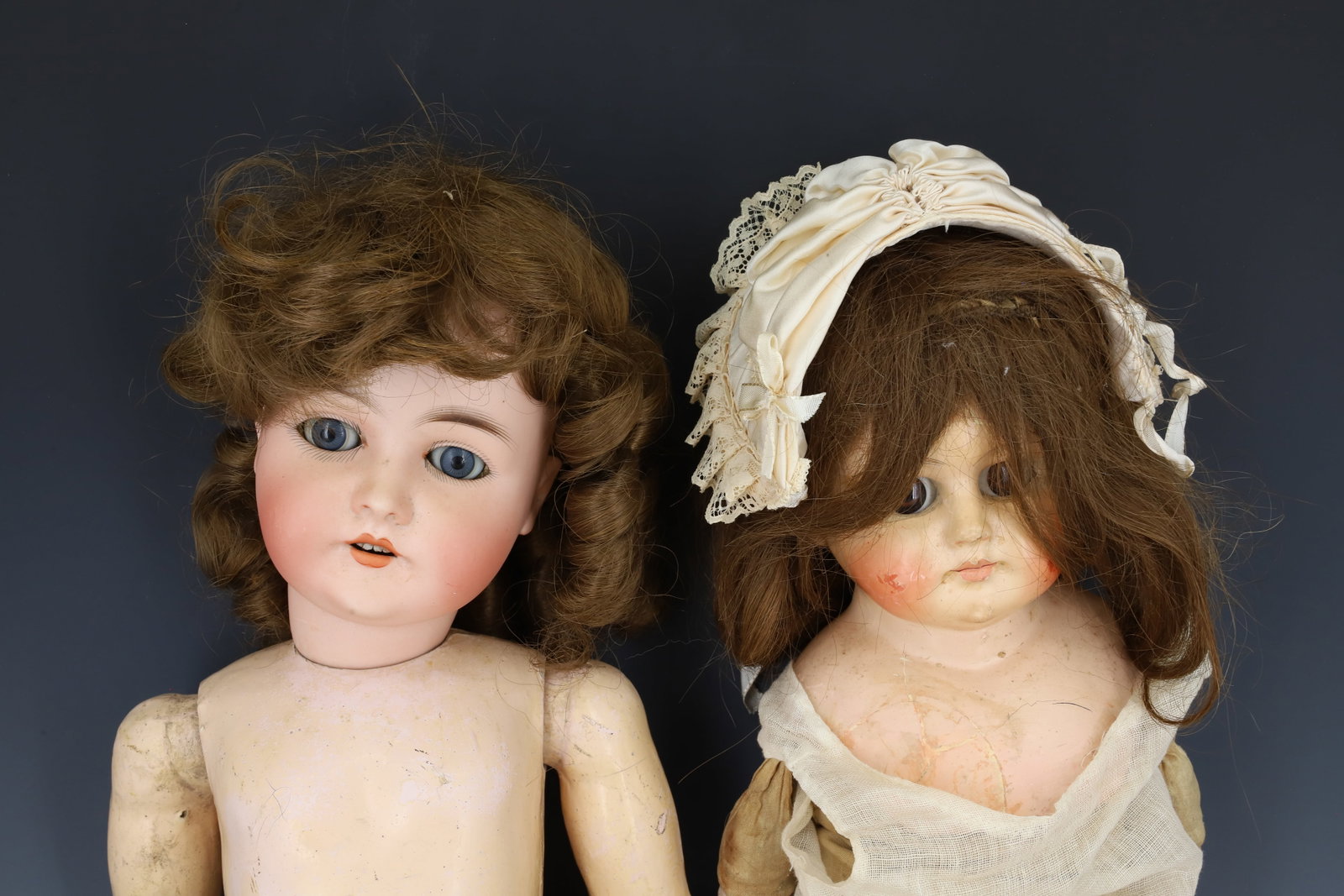 (2) ANTIQUE COMPOSITION / BISQUE DOLLS - 2