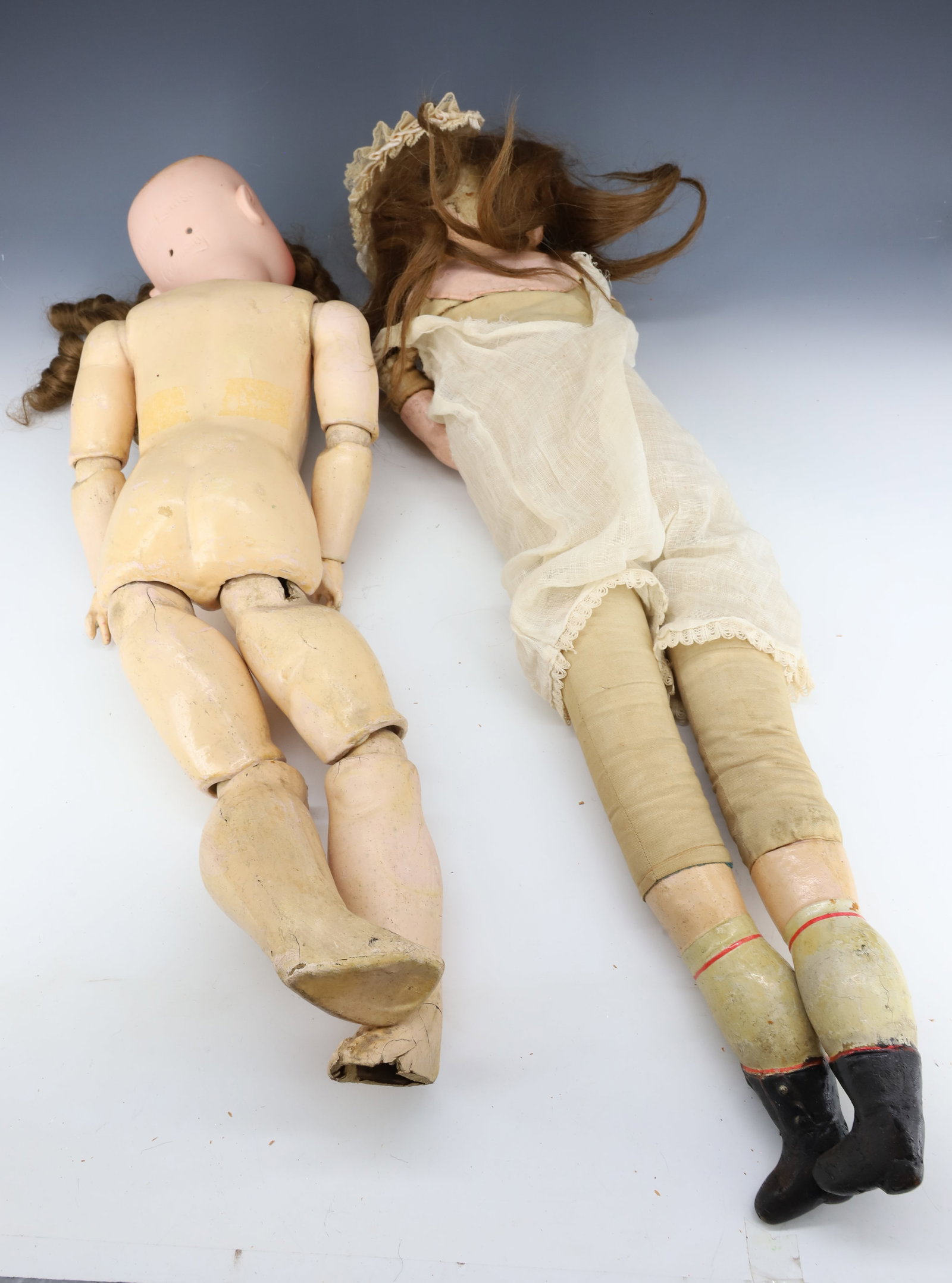 (2) ANTIQUE COMPOSITION / BISQUE DOLLS - 7