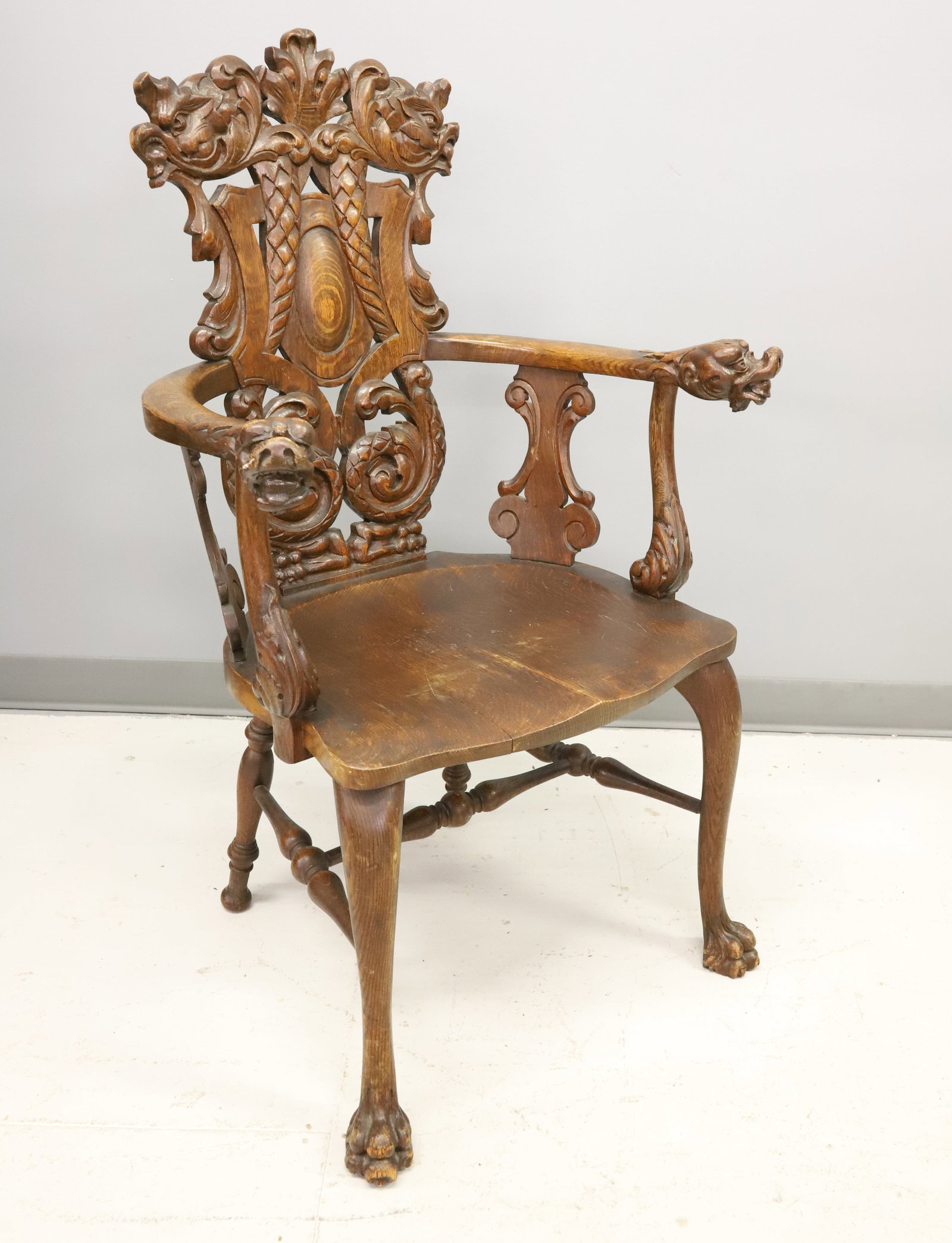 HEAVILY CARVED OAK HALL CHAIR (1 of 9)