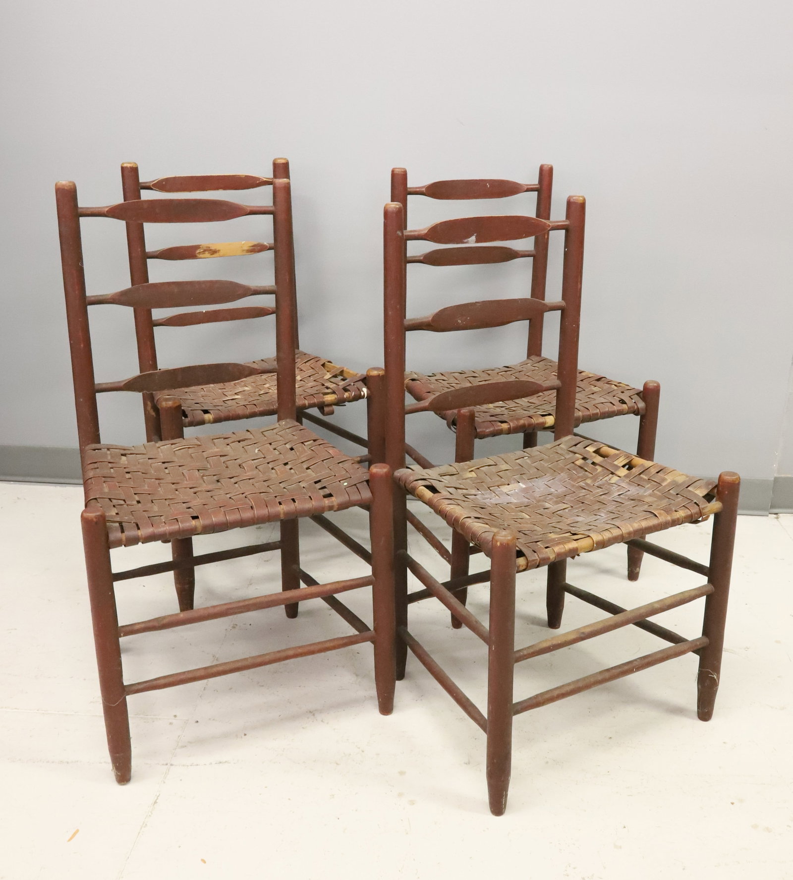 MATCHING SET OF PAINTED CHAIRS: RED PAINTED WITH WOVEN SEATS. 33" X 18 1/4" X 13 1/2". PLEASE READ CAREFULLY - ITEMS MUST BE PAID FOR THROUGH LIVE AUCTIONEERS OR WITH CASH OR CHECK IN PERSON - Terms for Purchasing and Shipping of