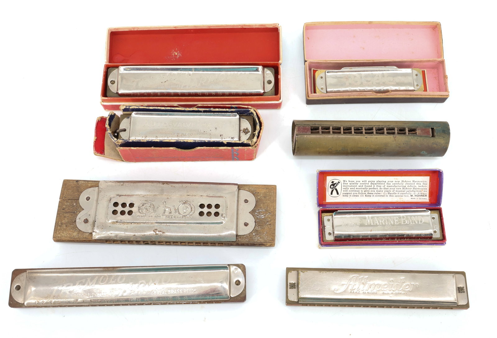 LOT OF VINTAGE HARMONICAS: (8) INCLUDING: TREMOLO, ALTMEISTER, M. HOHNER, IDEAL AND UNMARKED BRASS EXAMPLE. FOUR HAVE ORIGINAL BOXES. LARGEST 7 1/8" L.