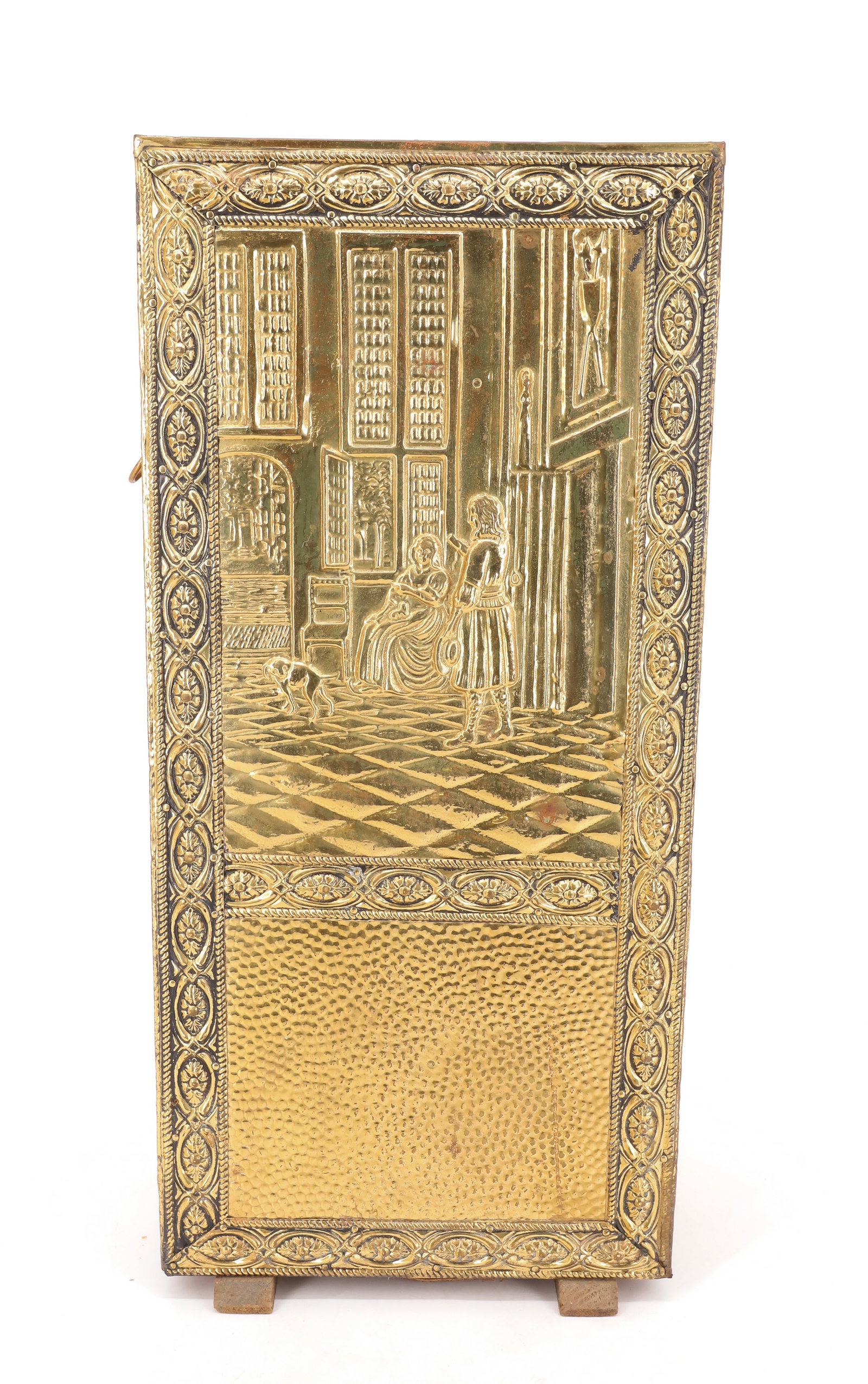 EMBOSSED BRASS UMBRELLA HOLDER: RECTANGULAR WITH DECORATIVE INTERIOR SCENE OF MAN WOMAN AND DOG. REMOVABLE BOTTOM TRAY. 21 3/4" X 10" X 6 1/2".