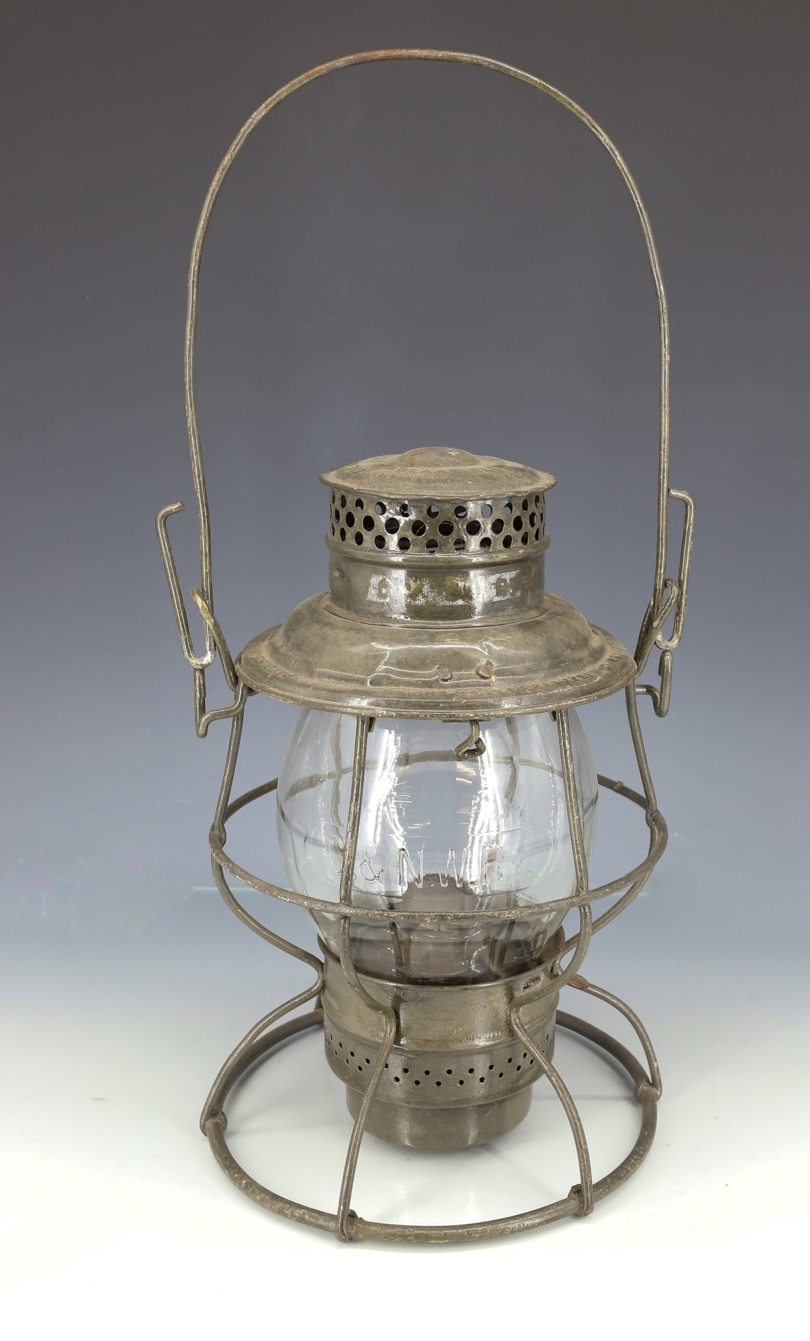 CHICAGO AND NORTHWESTERN RAILROAD LANTERN: MRKD. ON TOP "THE ADAMS & WESTLAKE CO. , C & N.W. RY" GLOBE EMBOSSED "C. & N.W. RY." 10" H.