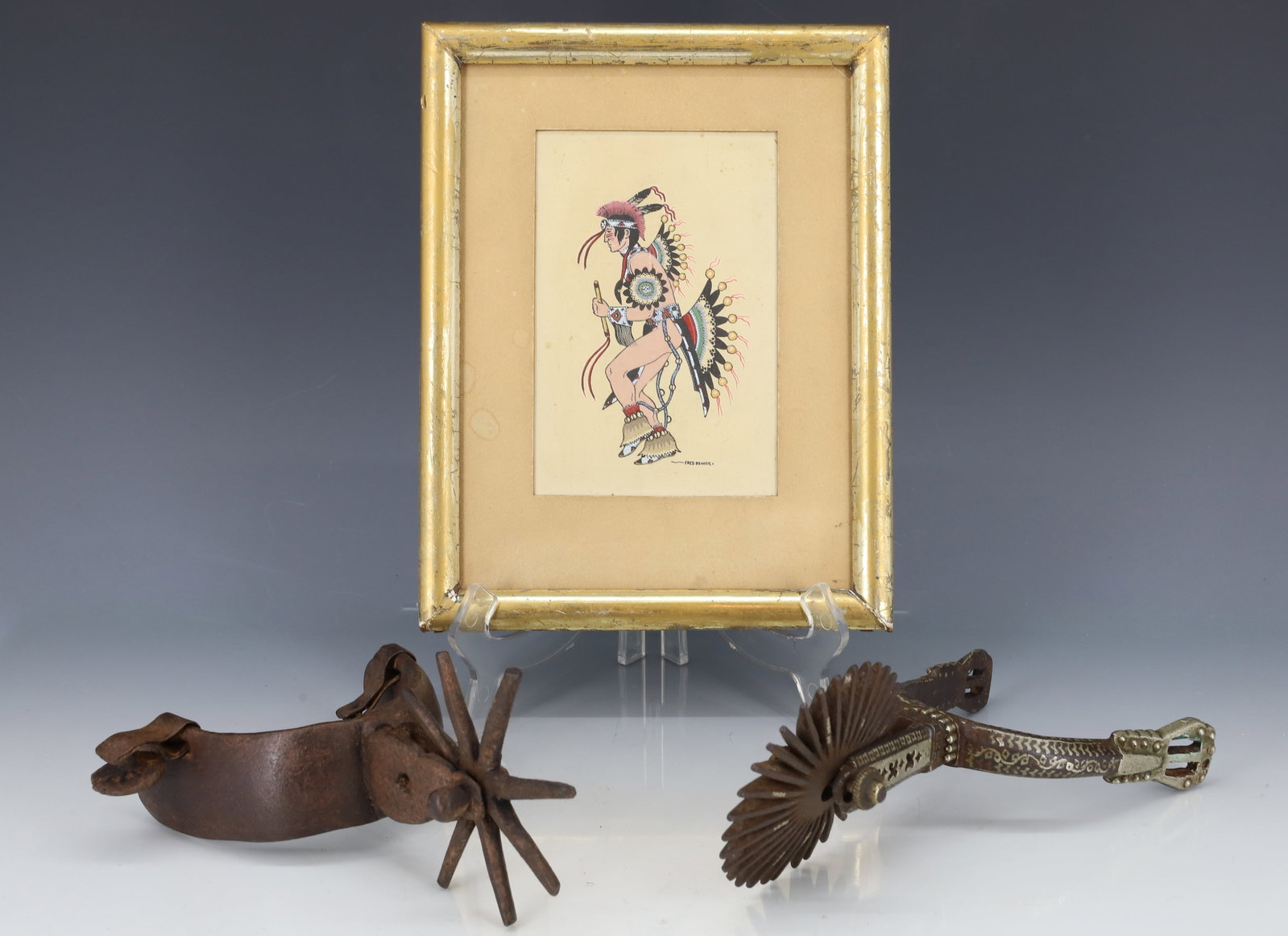 FRED BEAVER, "FAST WAR DANCER" W/ SPURS: (1911-1976) SGND. BOTTOM RIGHT. FRAMED UNDER GLASS. SIGHT VIEW 5 1/4" X 3 1/2". WITH, TWO WROUGHT SPURS. ONE WITH SILVER EMBELLISHMENT THROUGHOUT.