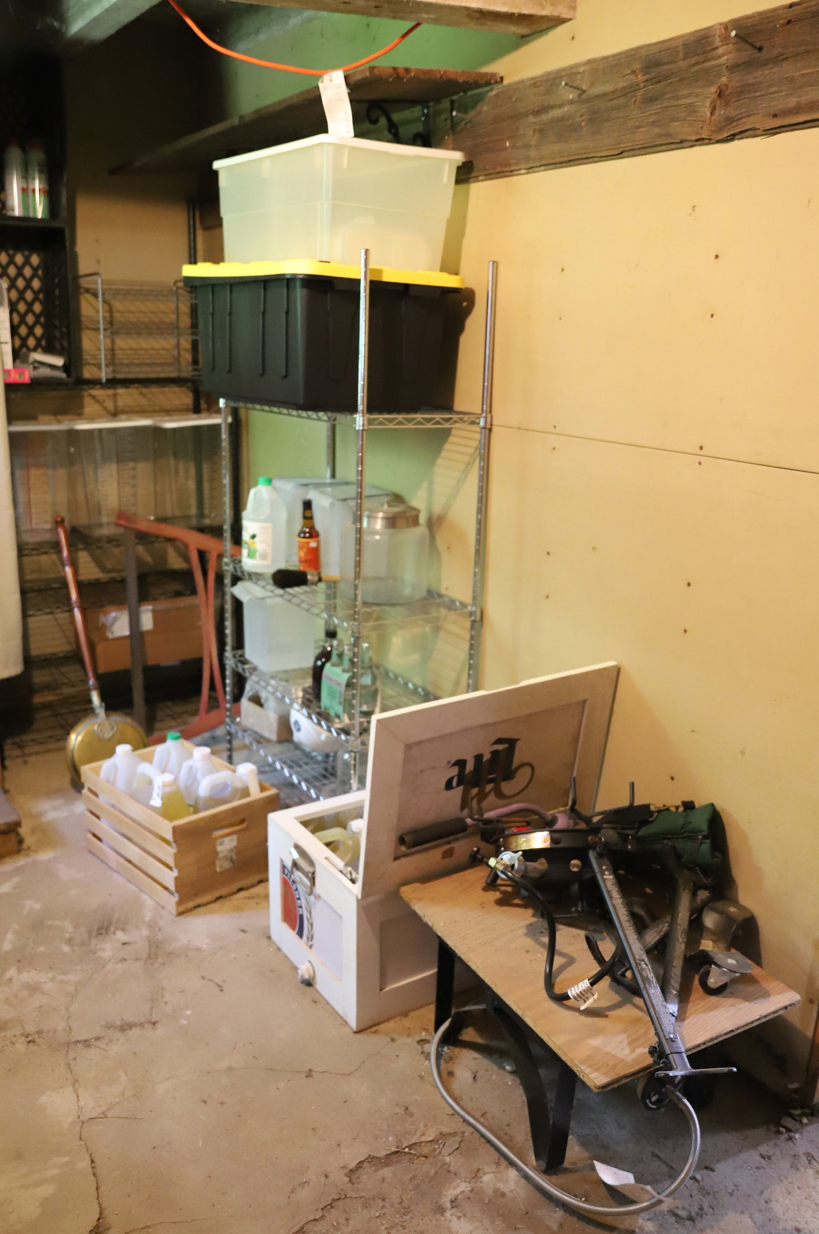 RACKS AND CONTENTS: TWO METAL RACKS, VINTAGE BED WARMER, PLASTIC TOT, AND MILLER LITE COOLER PLEASE READ CAREFULLY. THIS IS AN ONLINE ONLY AUCTION. PICK-UP WILL TAKE PLACE AT THE LOCATION OF THE AUCTION AT 1570 HARBOURTO