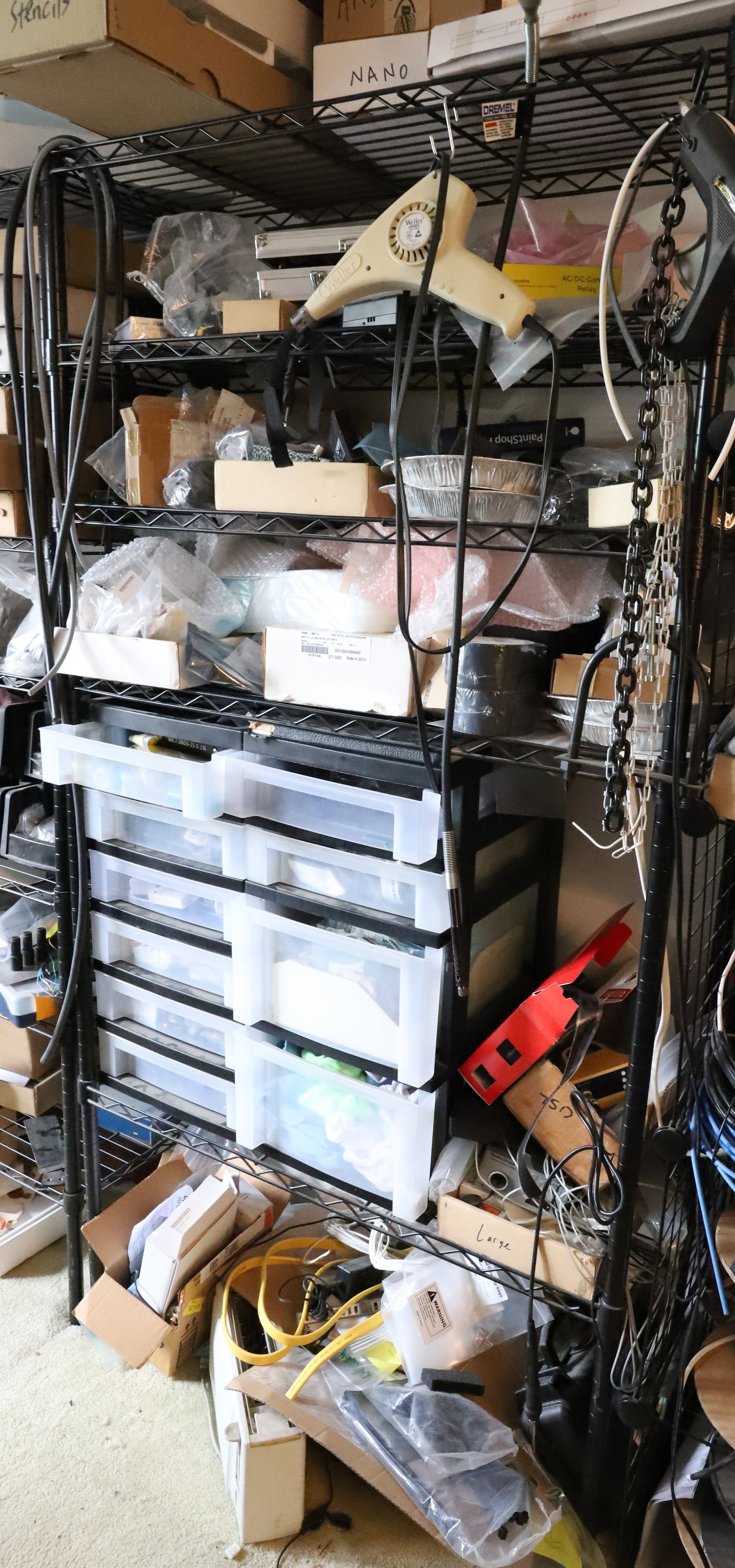 BLACK WIRE STANDING SHELF WITH CONTENTS: COMPUTER/AUDIO REPAIR ITEM, BLACK STANDING SHELF INCLUDED PLEASE READ CAREFULLY. THIS IS AN ONLINE ONLY AUCTION. PICK-UP WILL TAKE PLACE AT THE LOCATION OF THE AUCTION AT 1570 HARBOURTON ROCKTOWN RD, 