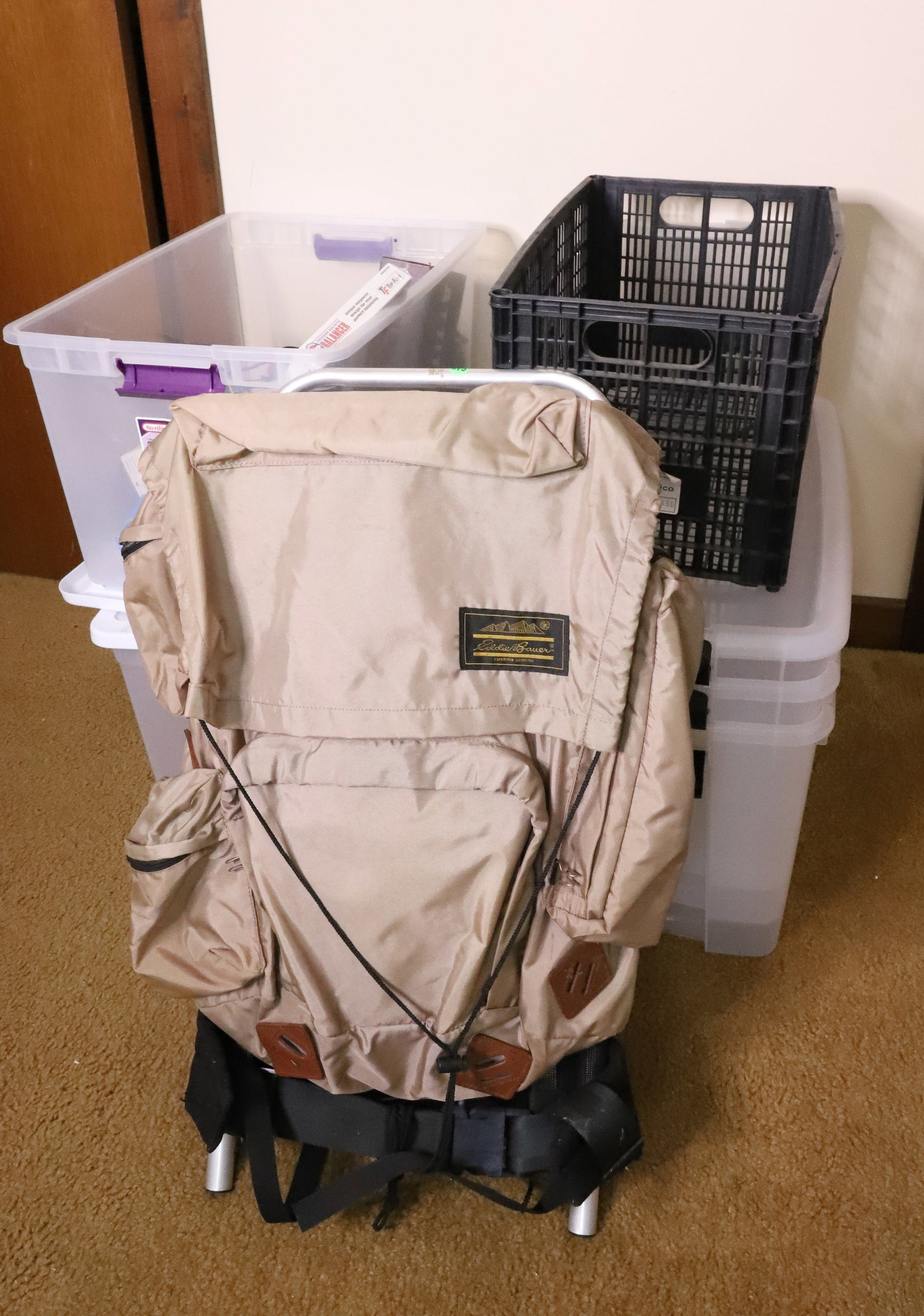 STORAGE BOXES, BACKPACK AND MORE: EDDIE BAUER BACKPACK, 5 CLEAR STORAGE BOXES, ECT PLEASE READ CAREFULLY. THIS IS AN ONLINE ONLY AUCTION. PICK-UP WILL TAKE PLACE AT THE LOCATION OF THE AUCTION AT 1570 HARBOURTON ROCKTOWN RD,