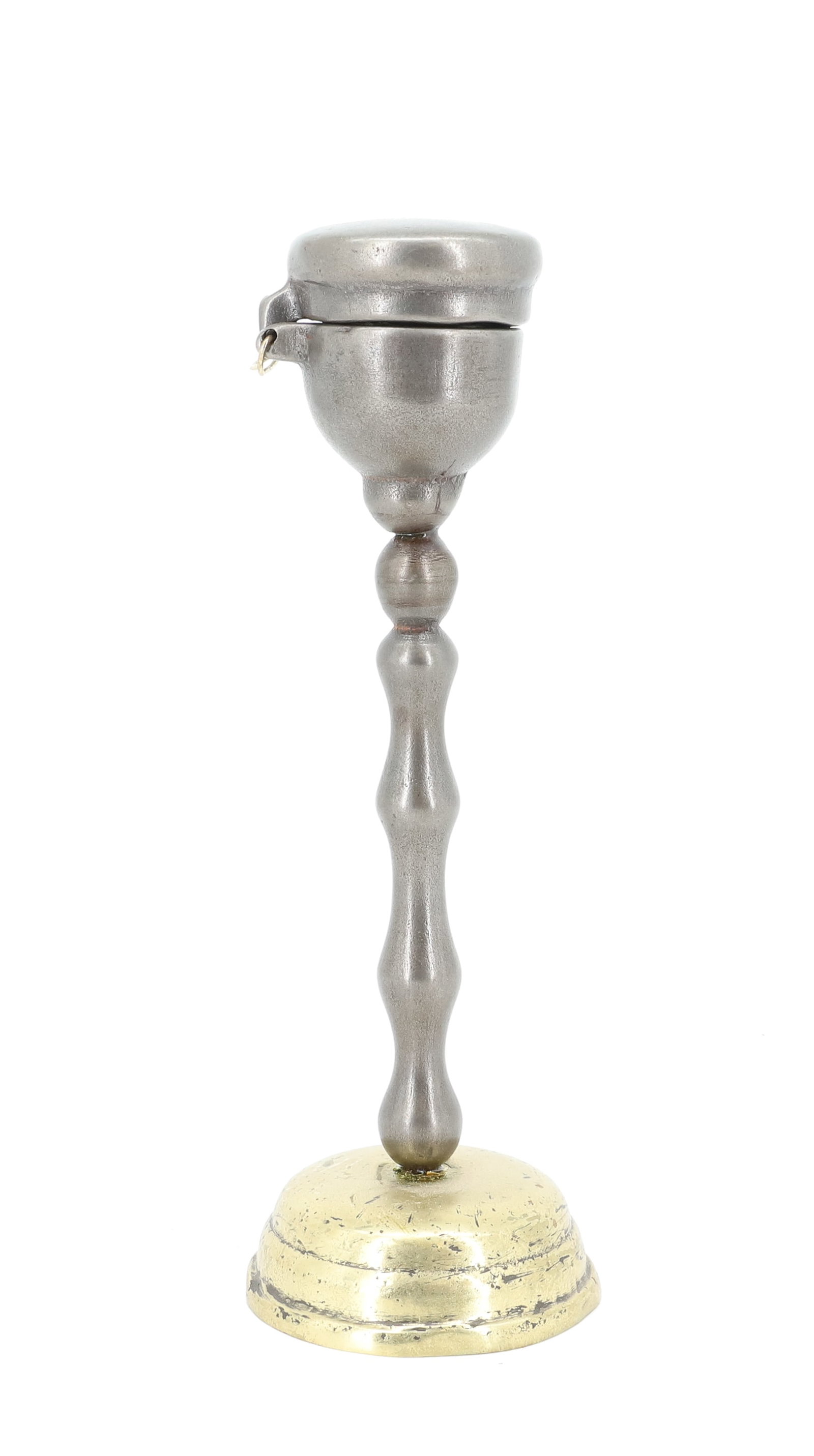 UNUSUAL EGG-STYLE IRON: BRASS BASE. TURNED POST. HINGED CAP-STYLE LID WITH INTERIOR SLUG. 8 1/4" H. PLEASE READ CAREFULLY - ITEMS MUST BE PAID FOR THROUGH LIVE AUCTIONEERS OR WITH CASH OR CHECK IN PERSON - Terms for