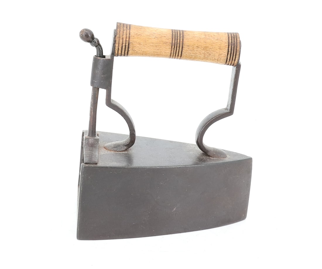 SMALL SIZE 19TH C. EUROPEAN BOX IRON: INTERIOR SLUG. REAR LIFT-GATE MRKD. W. WALKER. REVERSE "C" POSTS. TURNED WOODEN HANDLE. 4" L. PLEASE READ CAREFULLY - ITEMS MUST BE PAID FOR THROUGH LIVE AUCTIONEERS OR WITH CASH OR CHECK IN PERSON -