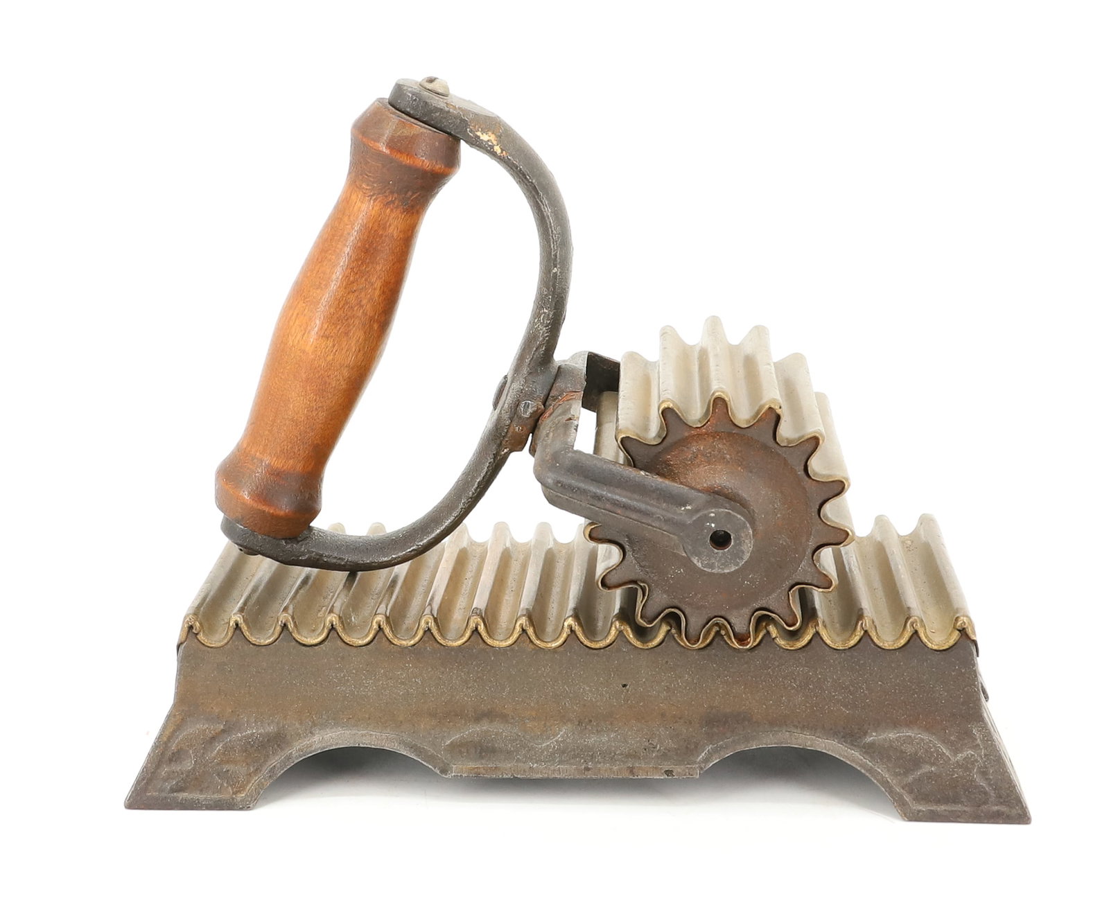 BRASS ROLLER / FLUTER: WOODEN GRIP. APPLIED BRASS ROLLER. MADE BY HENRY A. DOTY, JANESVILLE, WIS. PATENT JUNE 18, 1872. BASE IS 6 1/4" X 3". PLEASE READ CAREFULLY - ITEMS MUST BE PAID FOR THROUGH LIVE AUCTIONEERS OR WITH CA
