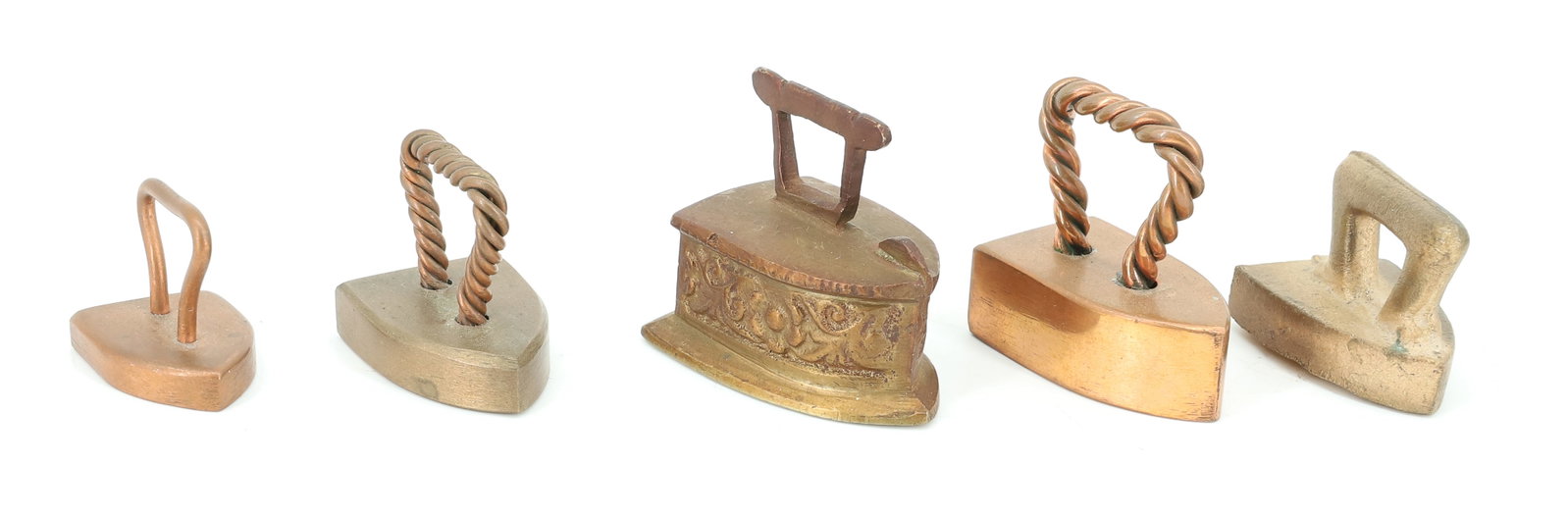 (5) MINIATURE BRASS / COPPER IRONS: (5) HANDMADE IRONS INCLUDING: BRASS AND COPPER FLAT IRONS, JAPANESE CHARCOAL IRON AND OTHERS. 1" TO 1 3/4" LENGTHS. PLEASE READ CAREFULLY - ITEMS MUST BE PAID FOR THROUGH LIVE AUCTIONEERS OR WITH CASH