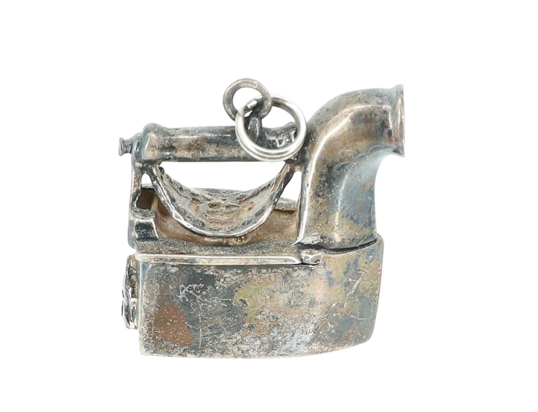 STERLING SILVER IRON CHARM: DRAGON CHARCOAL IRON. PLEASE READ CAREFULLY - ITEMS MUST BE PAID FOR THROUGH LIVE AUCTIONEERS OR WITH CASH OR CHECK IN PERSON - Terms for Purchasing and Shipping of Auction Items. Please read carefull