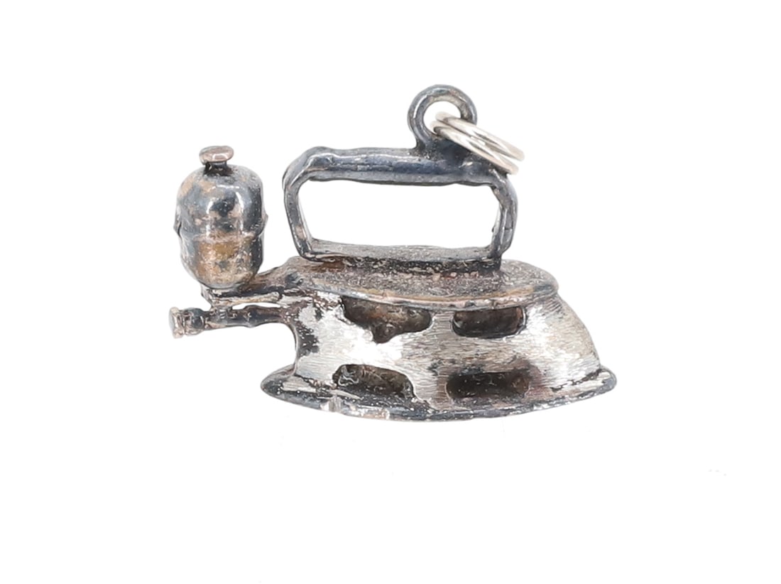 STERLING SILVER IRON CHARM: DOUBLE-POINT WITH REAR TANK. PLEASE READ CAREFULLY - ITEMS MUST BE PAID FOR THROUGH LIVE AUCTIONEERS OR WITH CASH OR CHECK IN PERSON - Terms for Purchasing and Shipping of Auction Items. Please read c