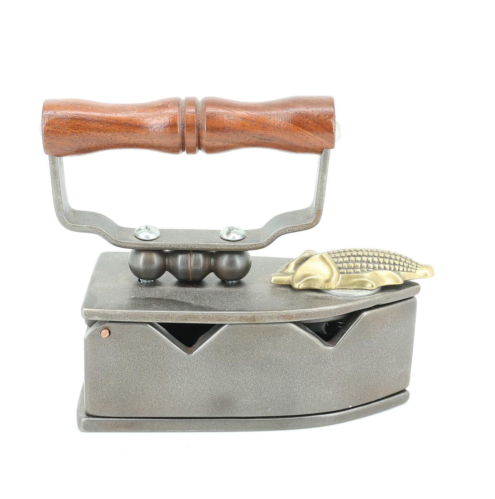 HANDMADE LIFT-LID SMALL SIZE CHARCOAL IRON: CUSTOM MADE IRON WITH BRASS CORNCOB FRONT LATCH. APPLIED HANDLE AND PIERCED "W" ON REAR. 4 1/2" L. PLEASE READ CAREFULLY - ITEMS MUST BE PAID FOR THROUGH LIVE AUCTIONEERS OR WITH CASH OR CHECK IN PERS