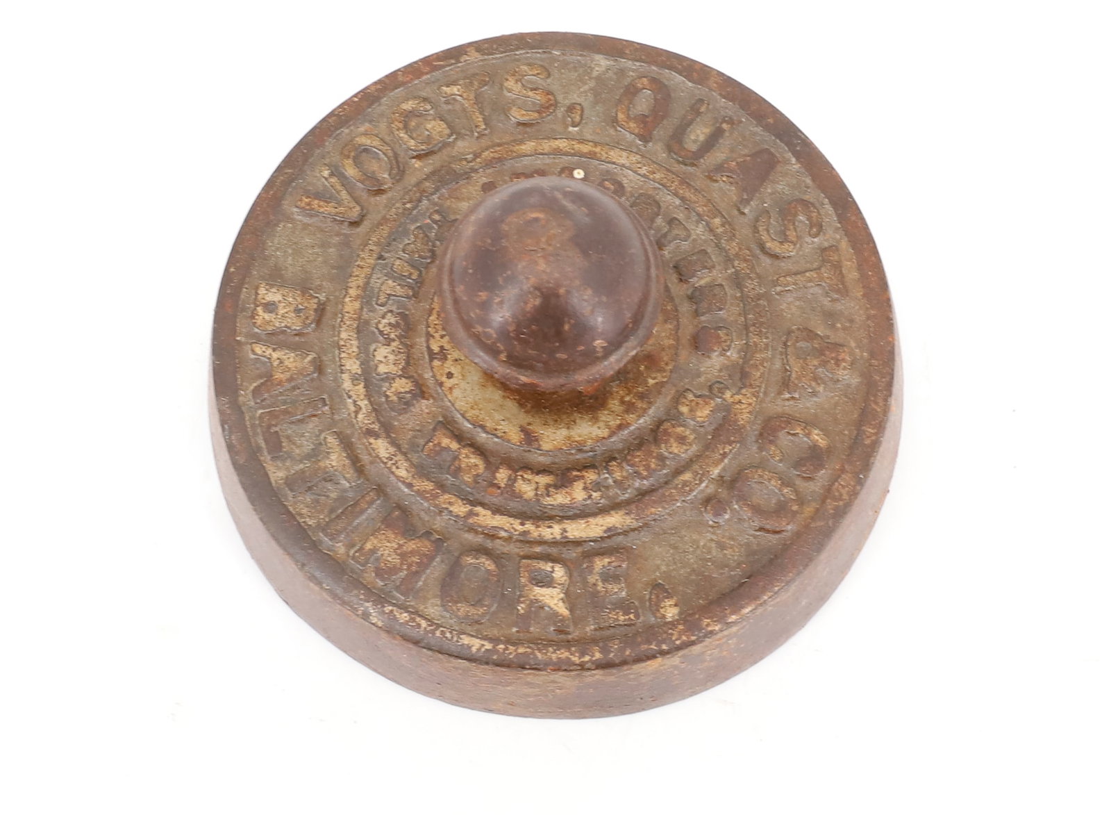 CAST IRON ADVERTISING PAPERWEIGHT: VOGTS, QUAST & CO., BALTIMORE, IMPORTERS / TAILORS / TRIMMINGS 3 1/2" D. PLEASE READ CAREFULLY - ITEMS MUST BE PAID FOR THROUGH LIVE AUCTIONEERS OR WITH CASH OR CHECK IN PERSON - Terms for Purchasing 