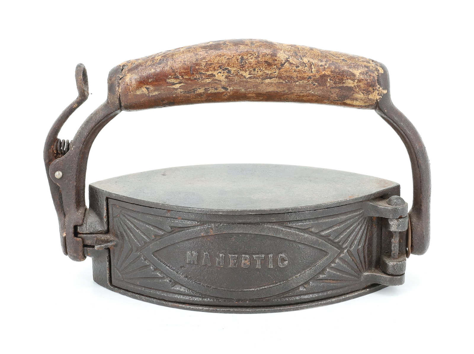 MAJESTIC REVOLVING IRON: CAST IRON BODY WITH INTERIOR SLUG. MRKD. "MAJESTIC" ON SIDE DOOR. WOODEN HAND GRIP. 7 3/4" L. PLEASE READ CAREFULLY - ITEMS MUST BE PAID FOR THROUGH LIVE AUCTIONEERS OR WITH CASH OR CHECK IN PERSON - 