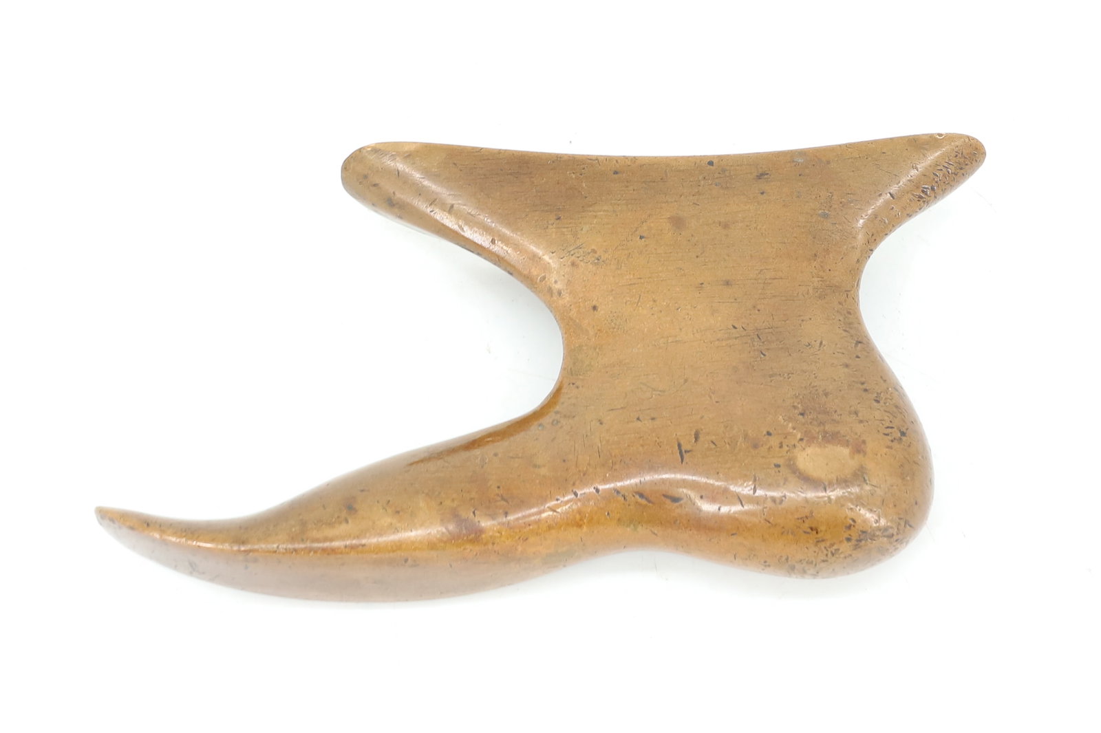 FIGURAL BRASS HAT TOLLIKER: HAT BRIM FINISHING TOOL WITH UNUSUAL FOOT SHAPED HANDLE. 5". PLEASE READ CAREFULLY - ITEMS MUST BE PAID FOR THROUGH LIVE AUCTIONEERS OR WITH CASH OR CHECK IN PERSON - Terms for Purchasing and Shipping