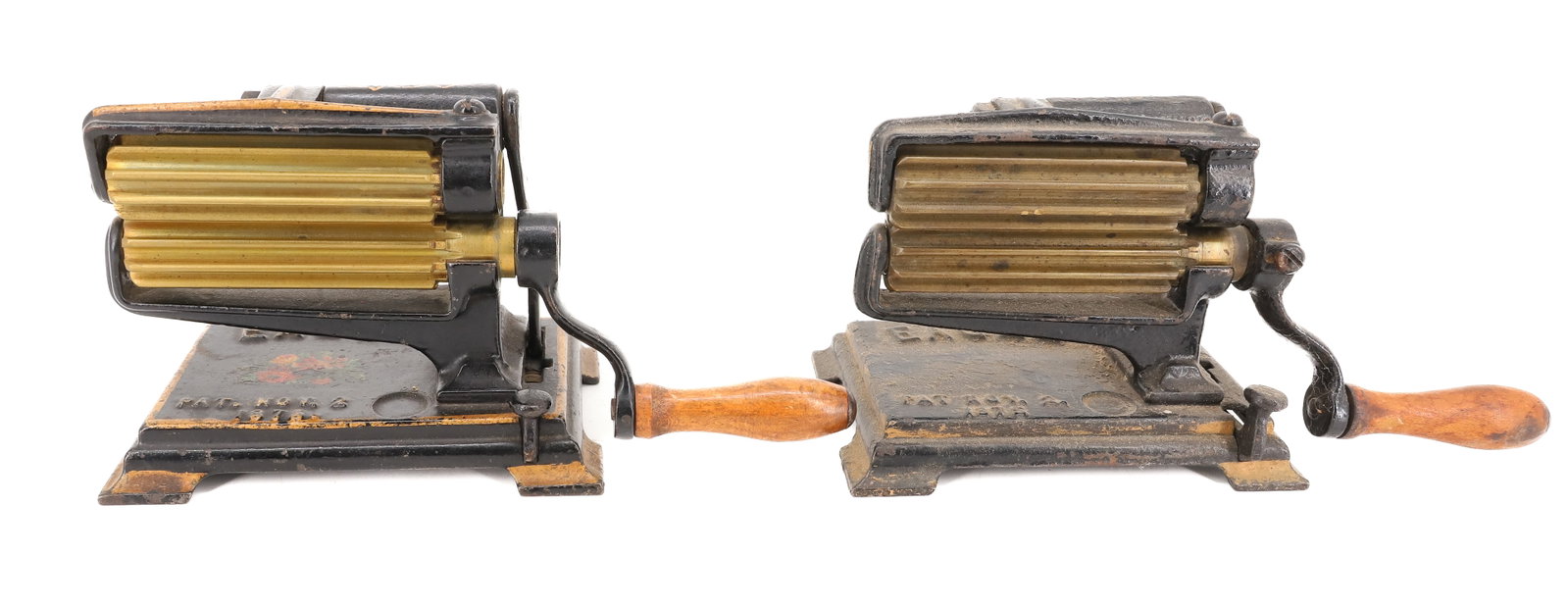 (2) SMALL SIZE "EAGLE" FLUTING MACHINES: ONE WITH BLACK / GOLD PAINTED SURFACE AND FLORAL DECAL. MRKD. PAT. NOV. 2 1875. BRASS ROLLERS 3 1/2" L. THE OTHER EXAMPLE HAS WORN PAINT AND NO DECAL. PLEASE READ CAREFULLY - ITEMS MUST BE PAID FOR TH