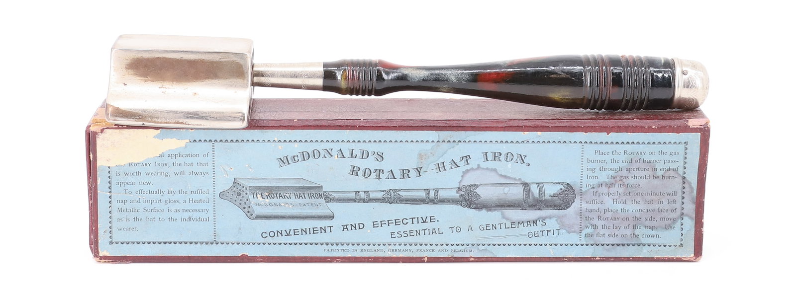 McDONALD'S ROTARY HAT IRON: STEEL HEAD WITH TURNED AND DECORATED HAND GRIP. WITH, ORIGINAL BOX. 9 1/2" L. PLEASE READ CAREFULLY - ITEMS MUST BE PAID FOR THROUGH LIVE AUCTIONEERS OR WITH CASH OR CHECK IN PERSON - Terms for