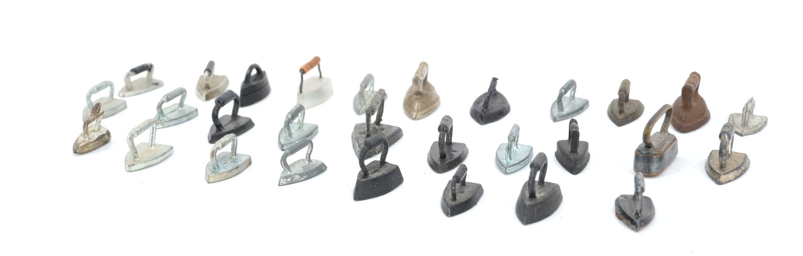 (29) MINIATURE PRESSING IRONS: VARIOUS STYLES, MATERIALS AND SIZES. 1/2" TO 3/4" LENGTHS. PLEASE READ CAREFULLY - ITEMS MUST BE PAID FOR THROUGH LIVE AUCTIONEERS OR WITH CASH OR CHECK IN PERSON - Terms for Purchasing and Shipping