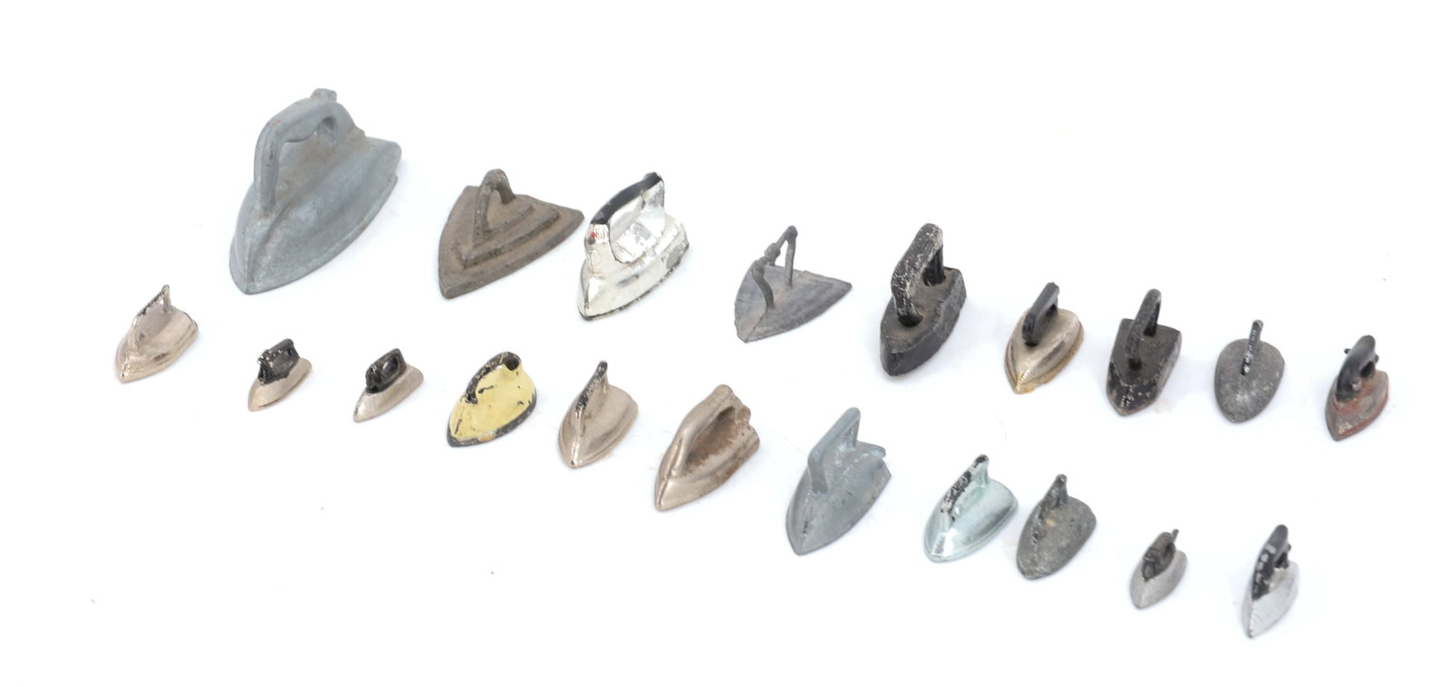 (20) MINIATURE PRESSING IRONS: VARIOUS STYLES, MATERIALS AND SIZES. 1/2" TO 3/4" LENGTHS. PLEASE READ CAREFULLY - ITEMS MUST BE PAID FOR THROUGH LIVE AUCTIONEERS OR WITH CASH OR CHECK IN PERSON - Terms for Purchasing and Shipping