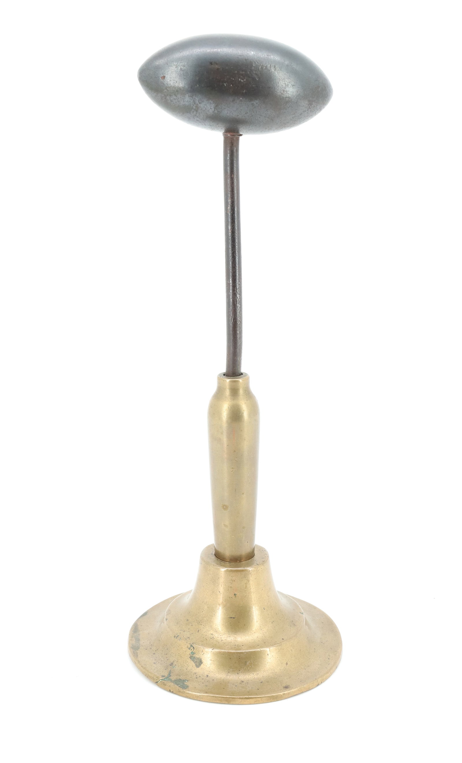 EGG IRON: CAST IRON EGG IRON WITH REMOVABLE POST IN FITTED BRASS BASE. EGG IS 3 1/2" L. 11 3/4" H. PLEASE READ CAREFULLY - ITEMS MUST BE PAID FOR THROUGH LIVE AUCTIONEERS OR WITH CASH OR CHECK IN PERSON - Terms