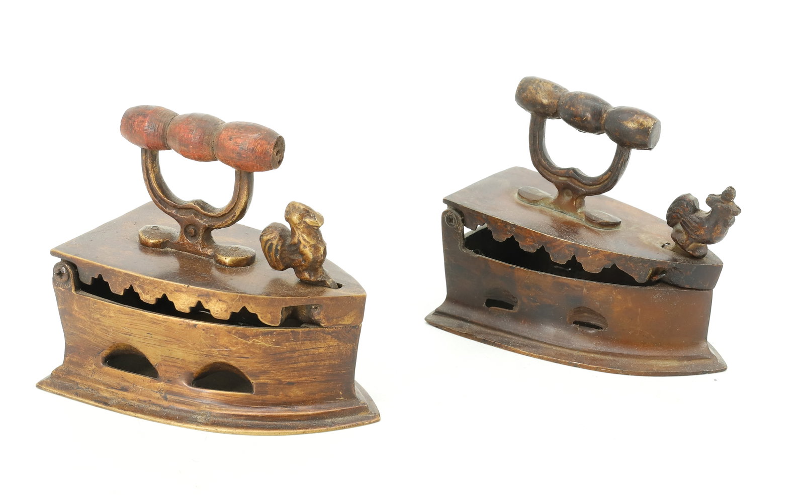 PAIR OF SMALL SIZE CHARCOAL IRONS: ROOSTER FRONT LATCH. BRASS HANDLE WITH BRASS OR COPPER BODY. 4" L. PLEASE READ CAREFULLY - ITEMS MUST BE PAID FOR THROUGH LIVE AUCTIONEERS OR WITH CASH OR CHECK IN PERSON - Terms for Purchasing and Sh