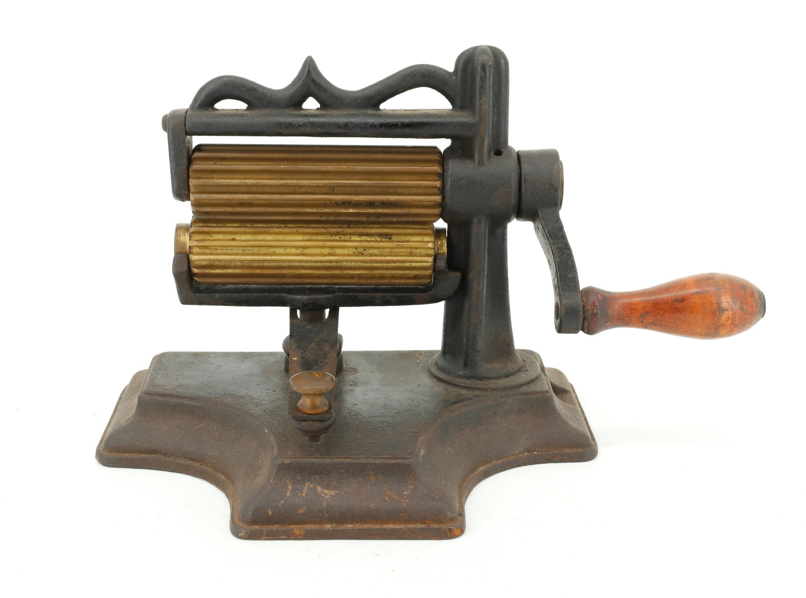 19TH C. FLUTING MACHINE: TRACES OF ORIGINAL PAINT. UNUSUAL FORM BASE. 4 1/2" ROLLERS. ILLEGIBLE MARK ON TOP. PLEASE READ CAREFULLY - ITEMS MUST BE PAID FOR THROUGH LIVE AUCTIONEERS OR WITH CASH OR CHECK IN PERSON - Terms for 