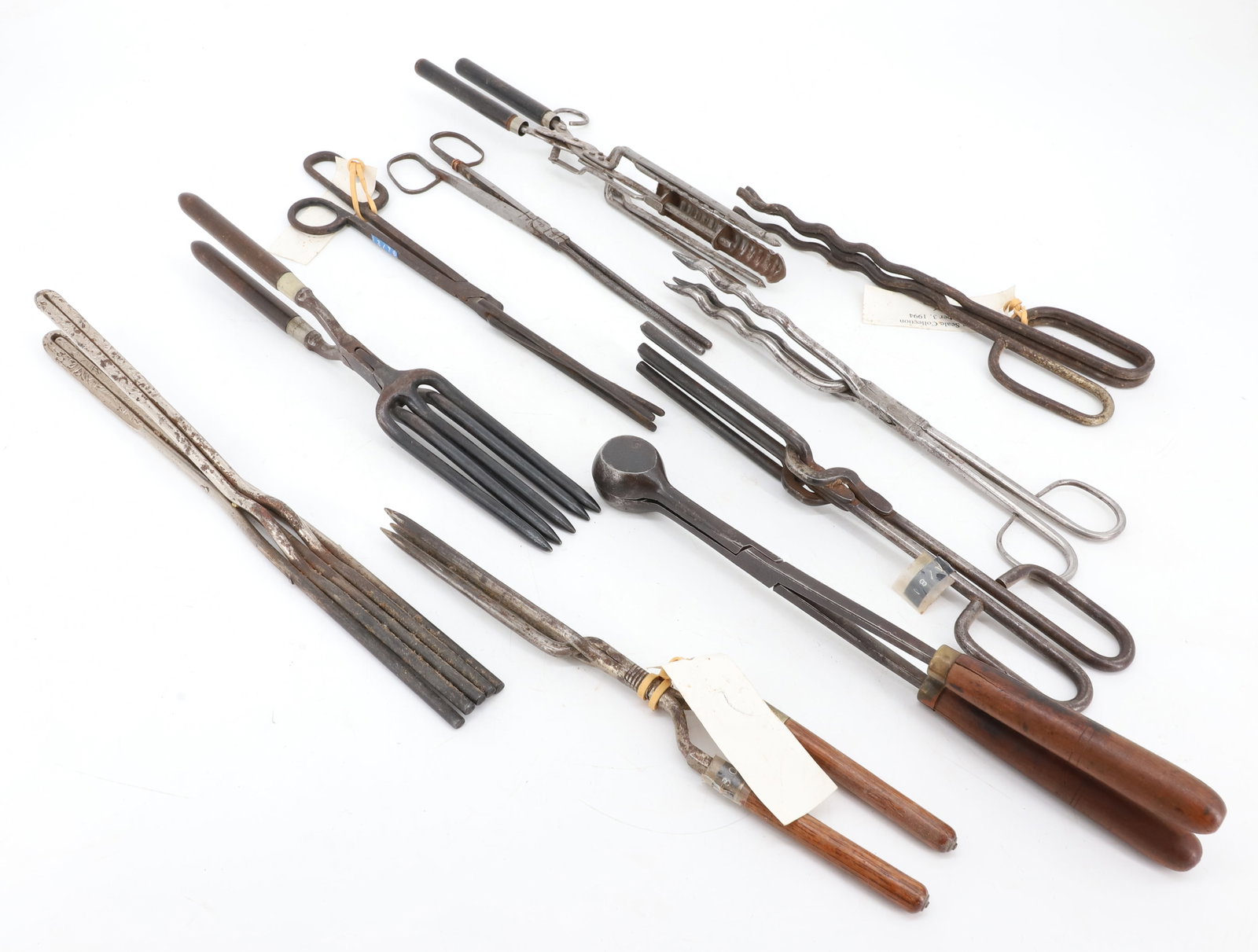 LOT OF (10) CURLING / CRIMPER IRONS: VARIOUS SHAPES AND STYLES. ONE BALL IRON MRKD. "LAFOSE & SON". PLEASE READ CAREFULLY - ITEMS MUST BE PAID FOR THROUGH LIVE AUCTIONEERS OR WITH CASH OR CHECK IN PERSON - Terms for Purchasing and Shippi
